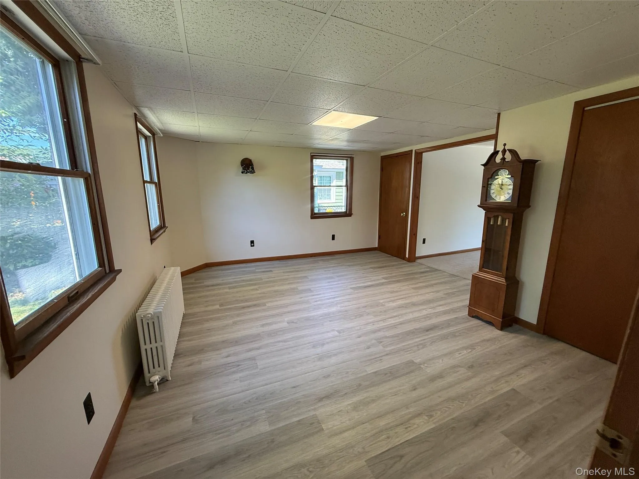 View of dining room that is freshly painted and brand new laminate flooring View of dining room that is freshly painted and brand new laminate flooring