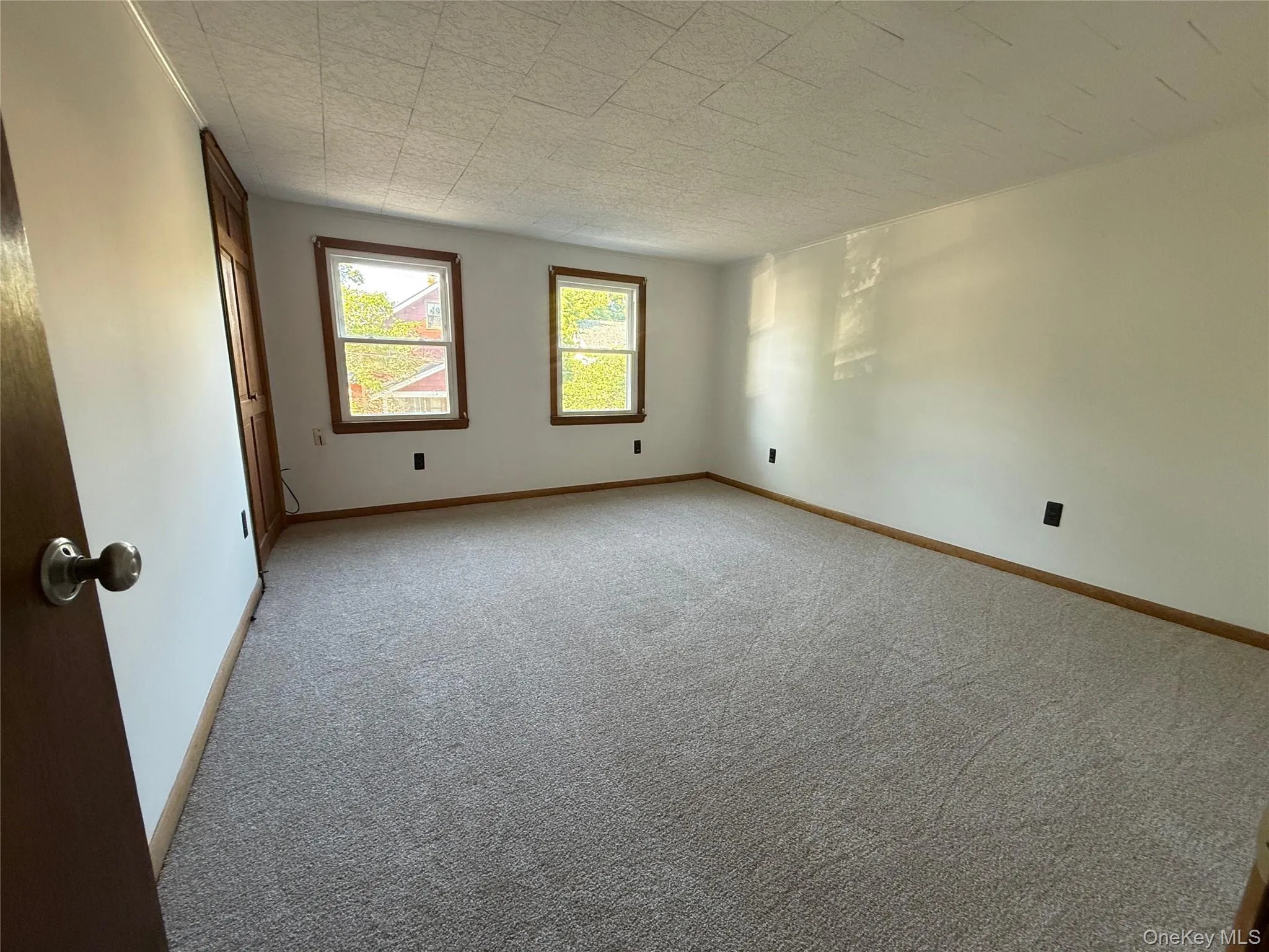 View of Bedroom 1 with new carpeting and freshly painted View of Bedroom 1 with new carpeting and freshly painted