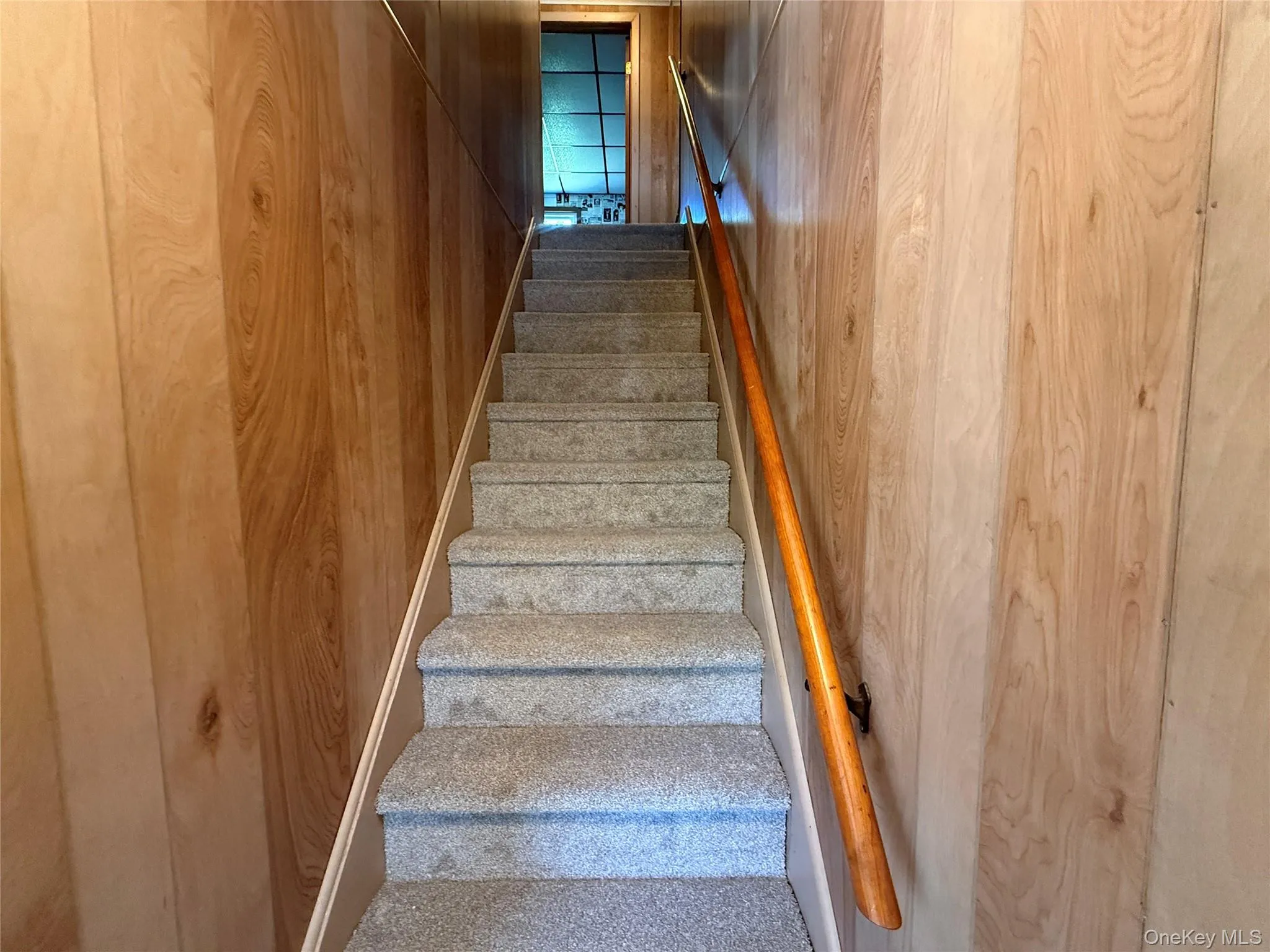 View of newly carpeted stairs leading to the bedroom and bathroom View of newly carpeted stairs leading to the bedroom and bathroom