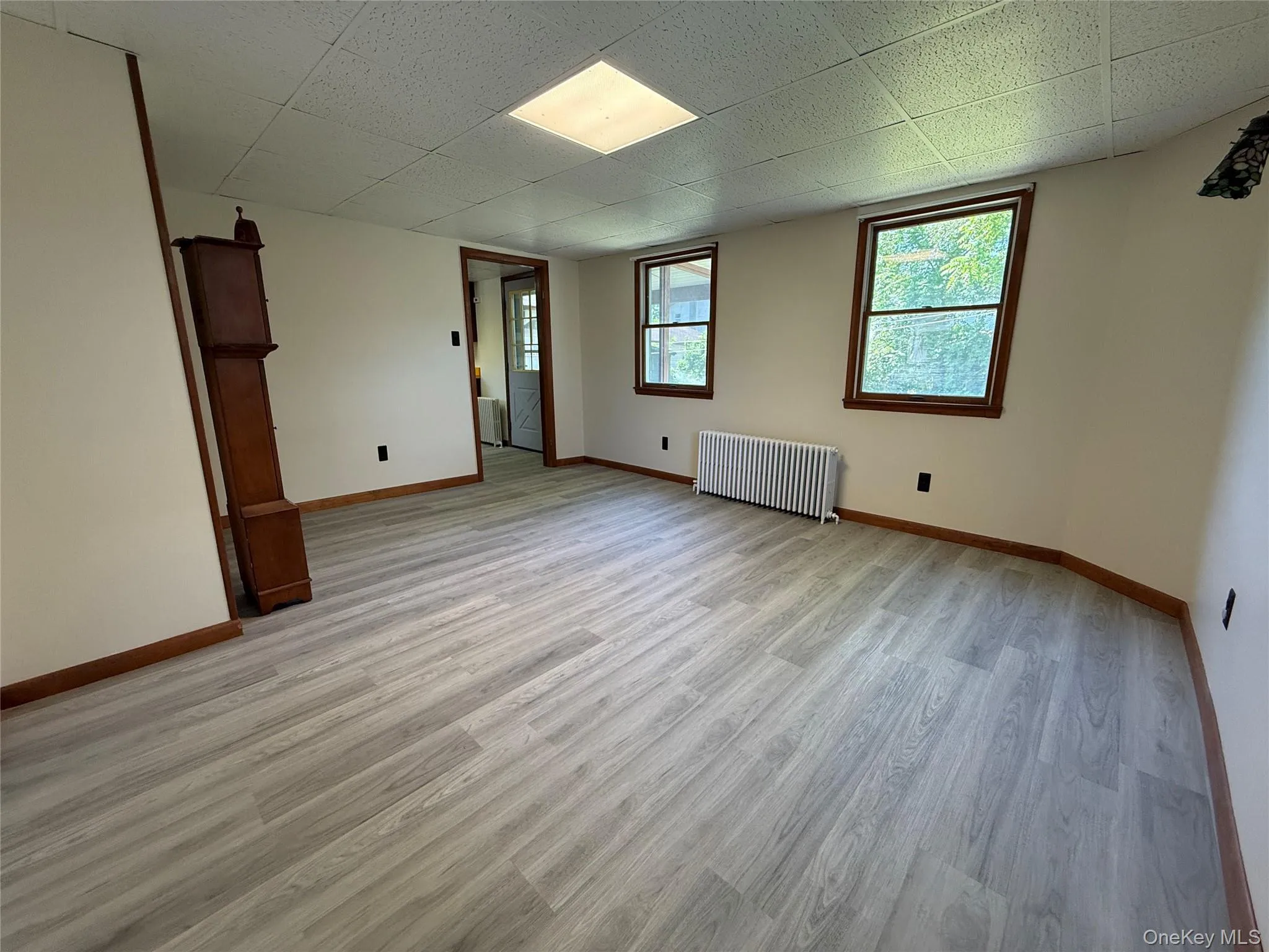 View of dining room that is freshly painted and brand new laminate flooring View of dining room that is freshly painted and brand new laminate flooring