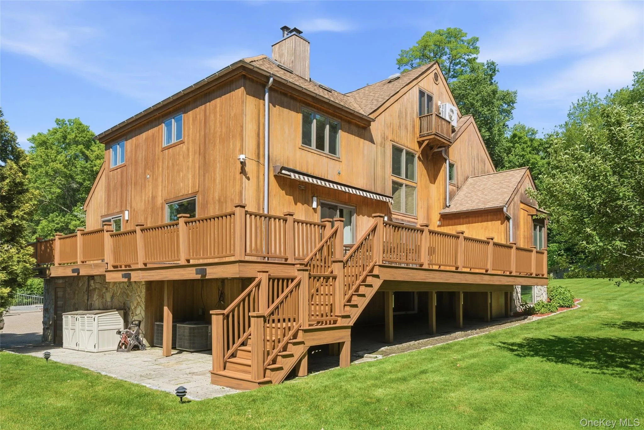 Multi-Level Outdoor Living: Expansive decking seamlessly extends the living space outdoors, overlooking the picturesque backyard. Multi-Level Outdoor Living: Expansive decking seamlessly extends the living space outdoors, overlooking the picturesque backyard.