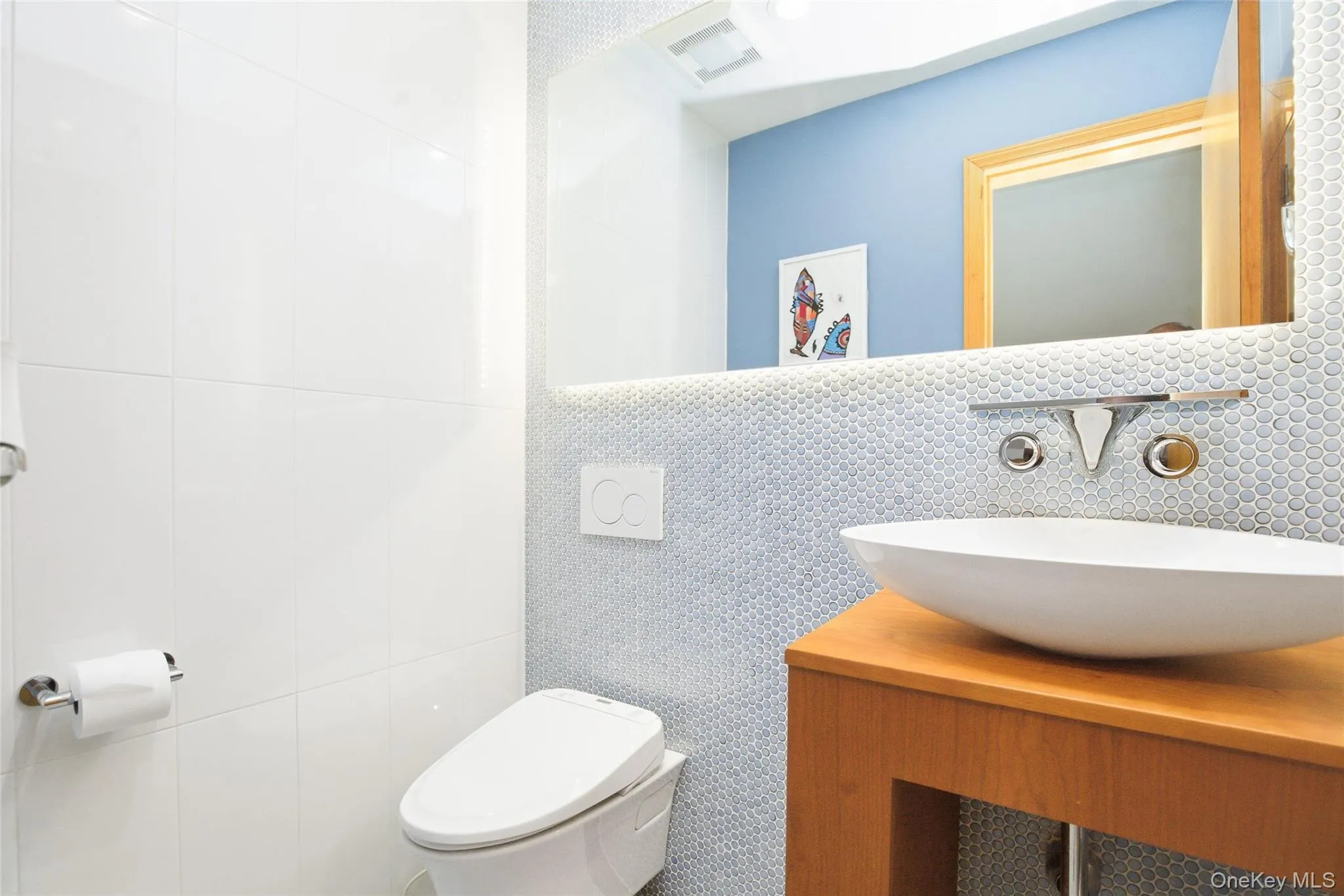 Beautifully Appointed First-Floor Powder Room Beautifully Appointed First-Floor Powder Room