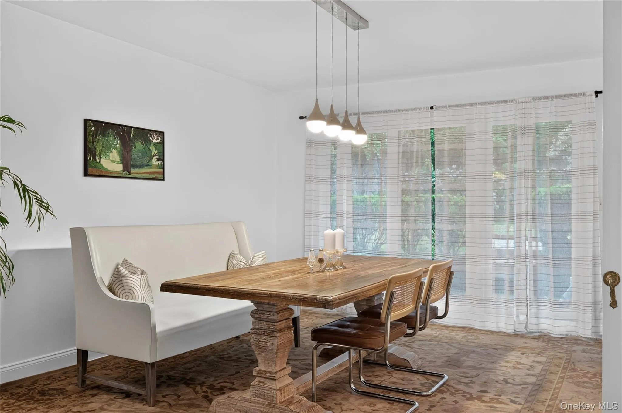 Spacious with a contemporary linear pendant fixture. Spacious with a contemporary linear pendant fixture.