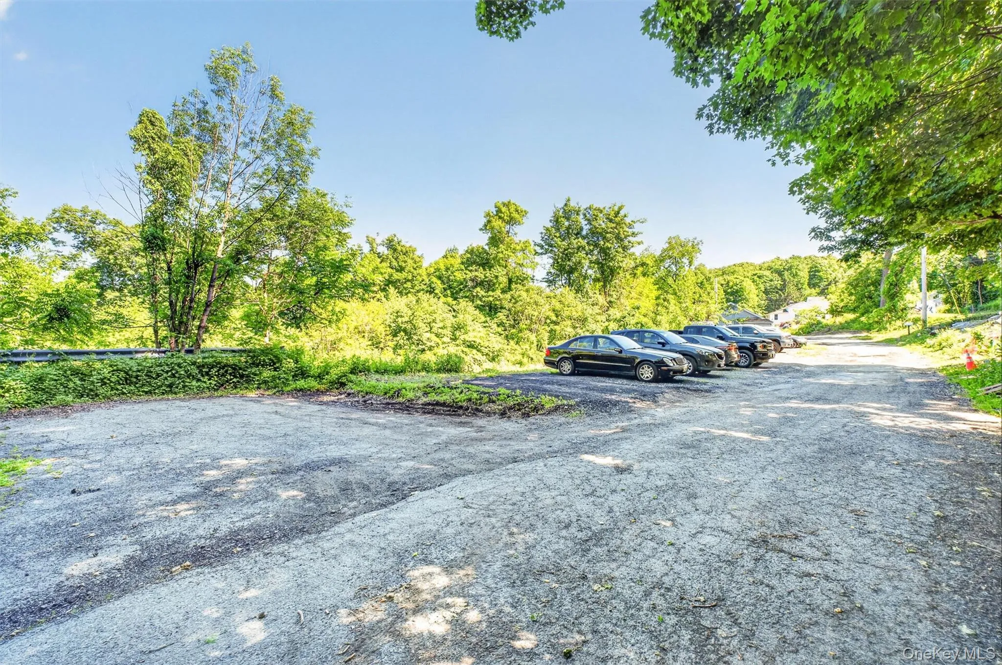 Between 37 and 46 Bowen Court, a large parking lot offers abundant parking and added convenience for residents and guests. Between 37 and 46 Bowen Court, a large parking lot offers abundant parking and added convenience for residents and guests.