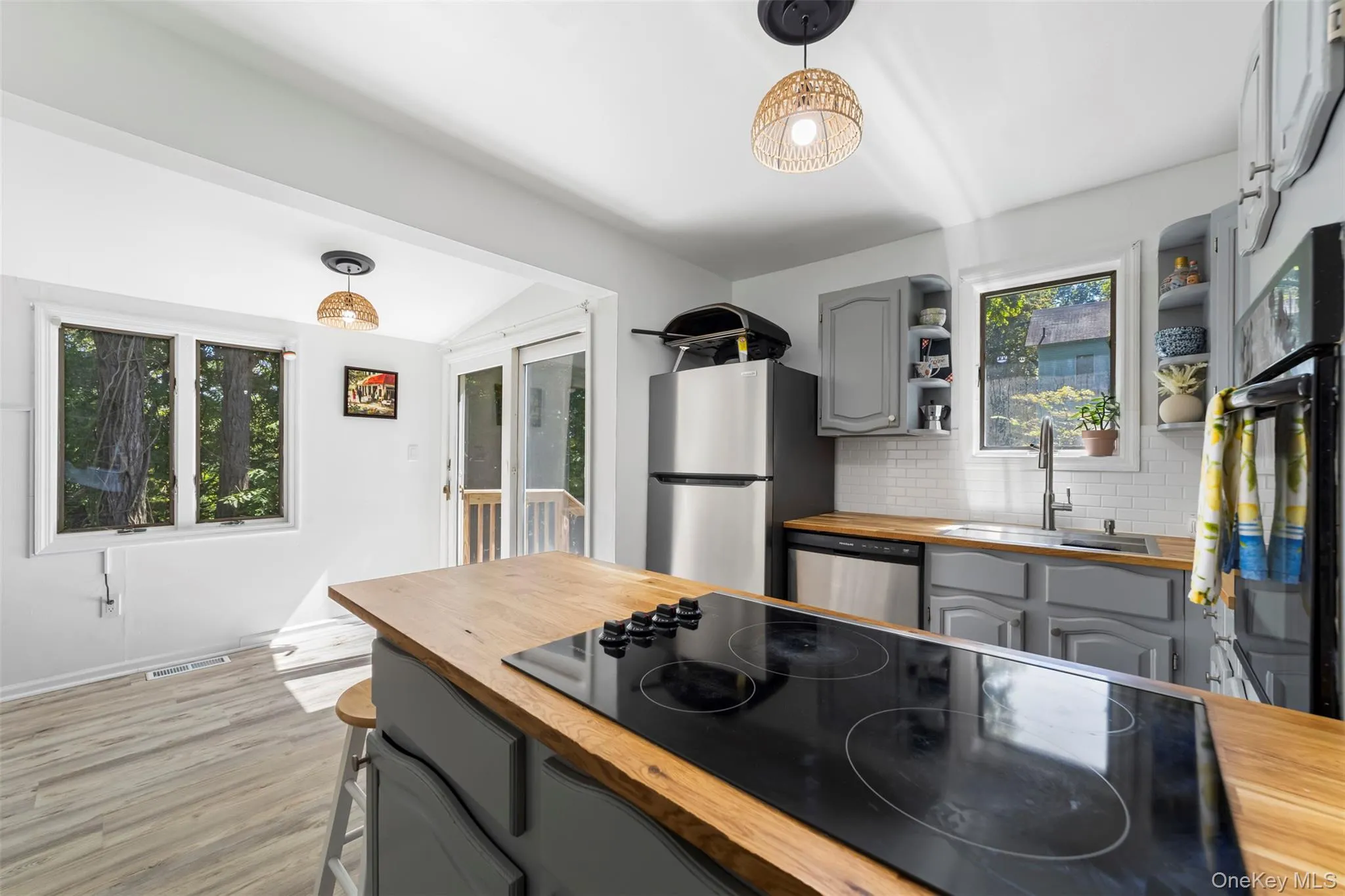 Large bright eat in kitchen with stainless steel appliances and skylight Large bright eat in kitchen with stainless steel appliances and skylight