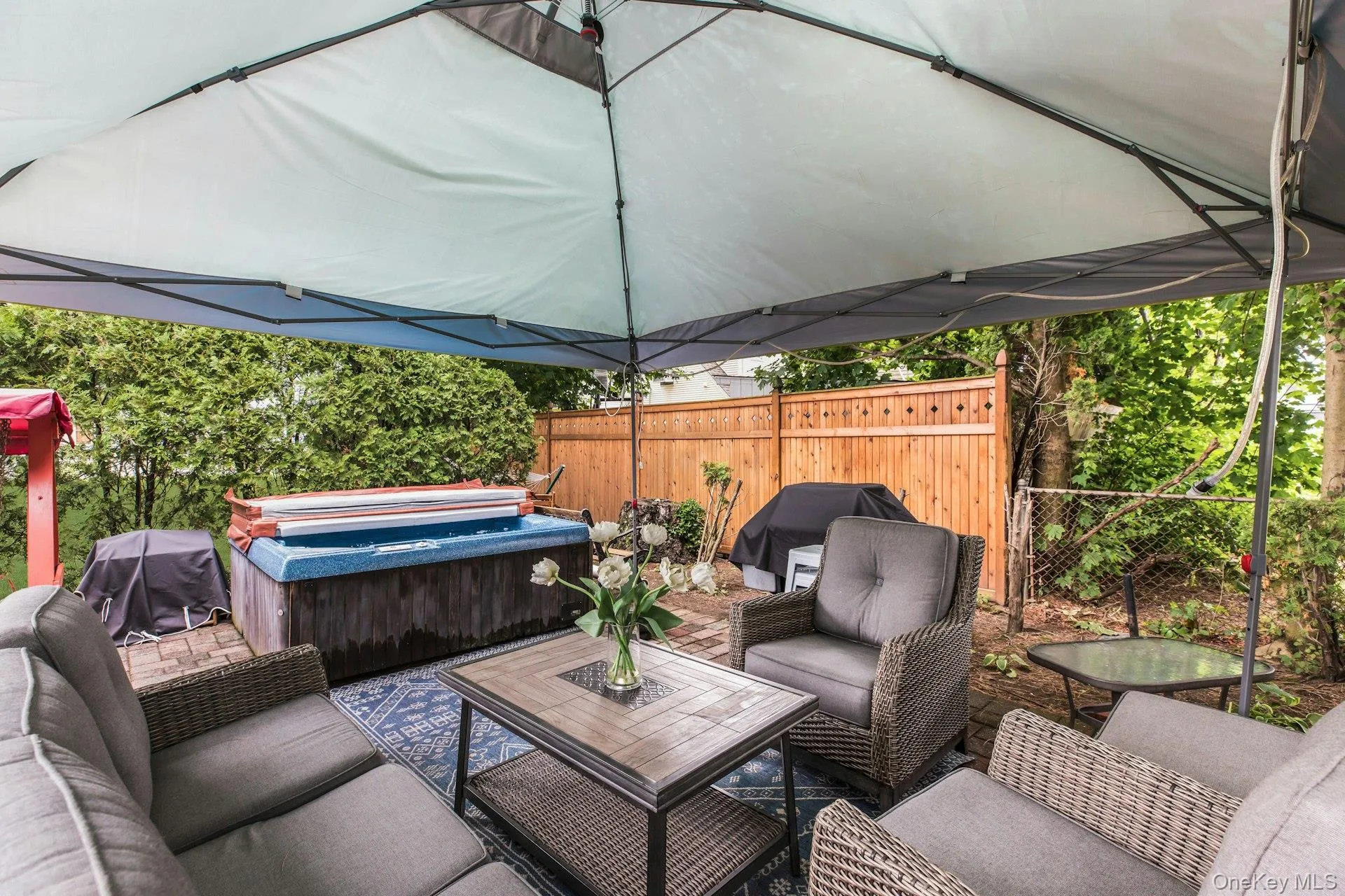 Tucked away, is your private, paved oasis with jacuzzi! Tucked away, is your private, paved oasis with jacuzzi!