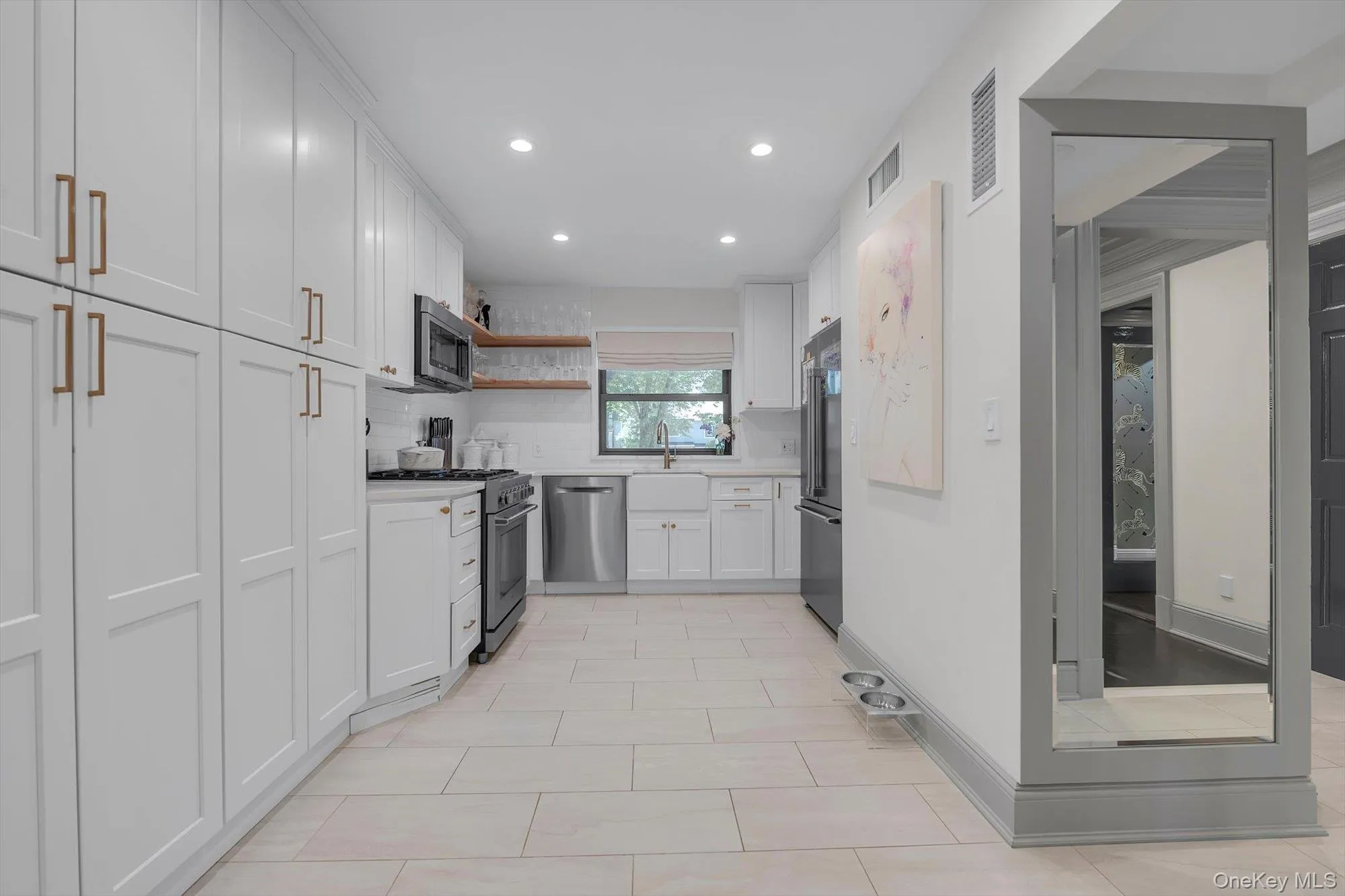 The updated kitchen features a layout ideal for both everyday living and entertaining The updated kitchen features a layout ideal for both everyday living and entertaining