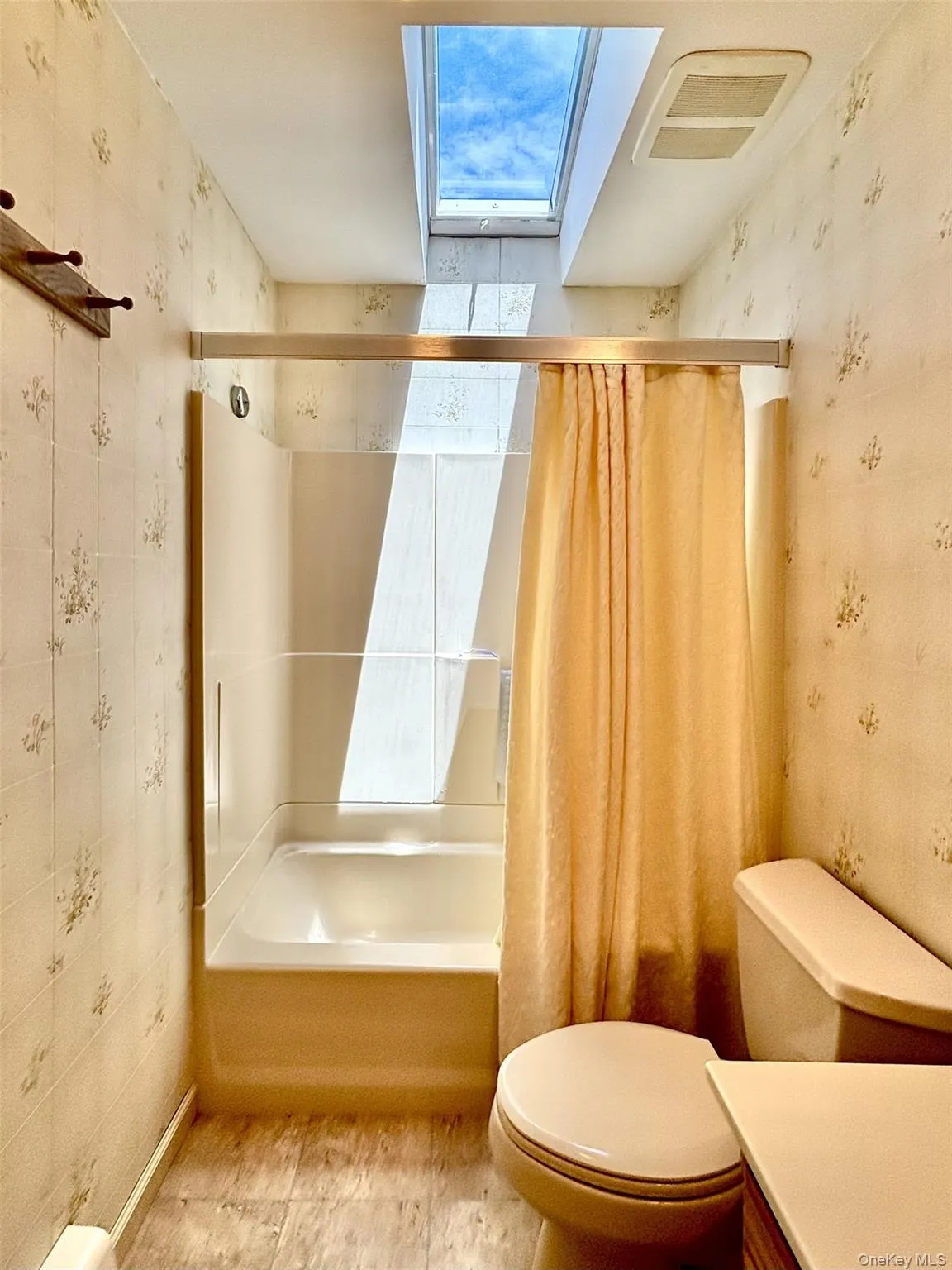 Full bathroom with opening skylight Full bathroom with opening skylight