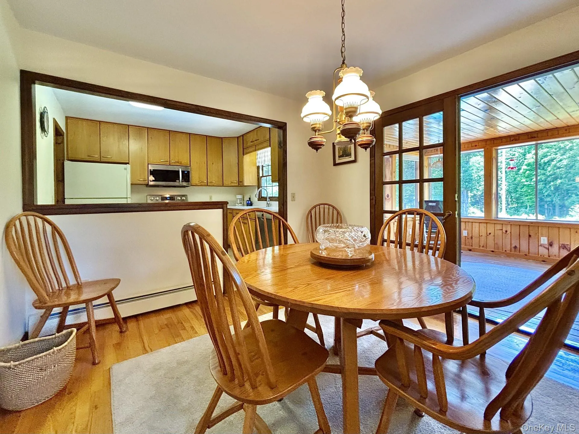 Opens to kitchen, glassed porch & the Living room Opens to kitchen, glassed porch & the Living room