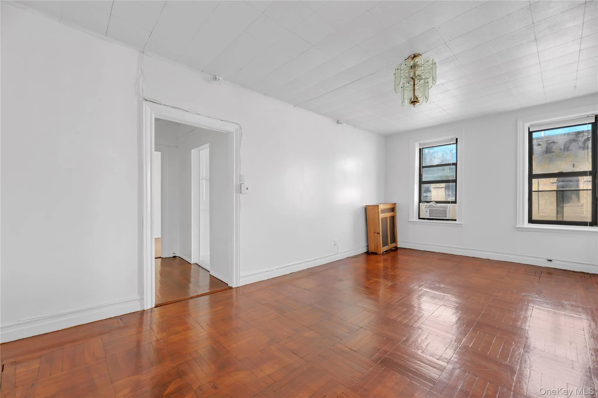 Empty room with baseboards Empty room with baseboards