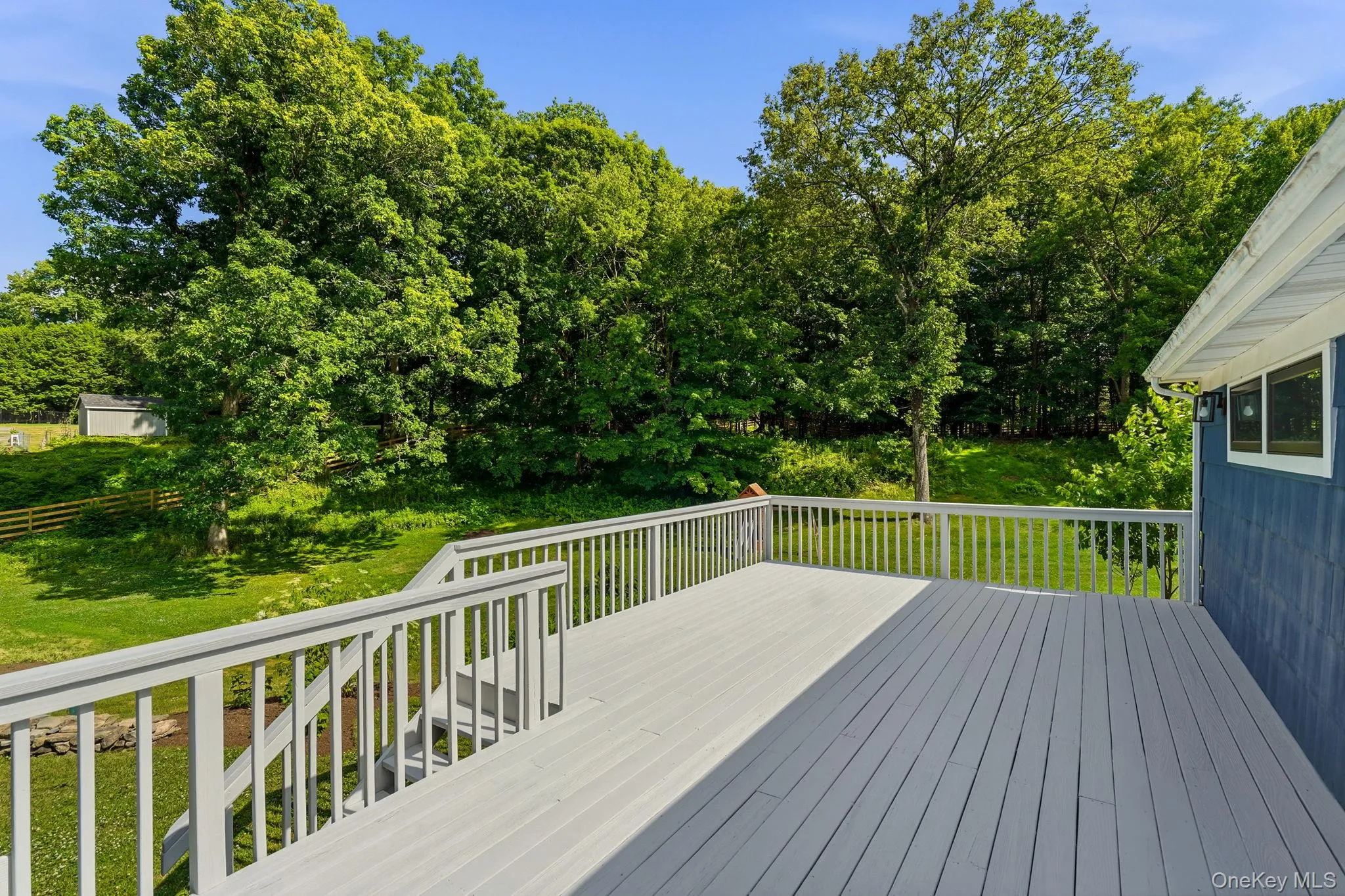 Generous deck looking out to back yard Generous deck looking out to back yard