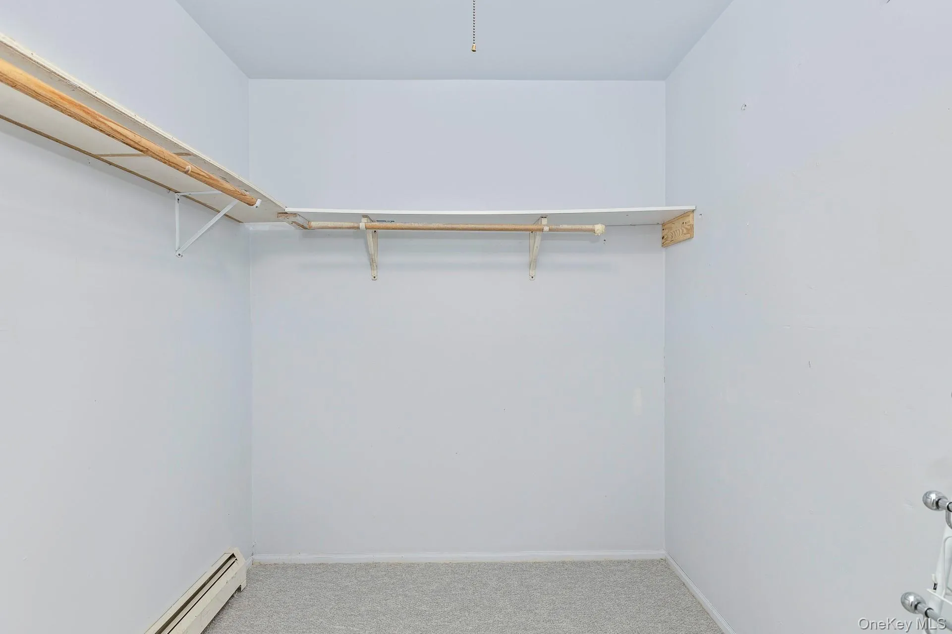 Walk in closet, heated and new berber carpet. Walk in closet, heated and new berber carpet.