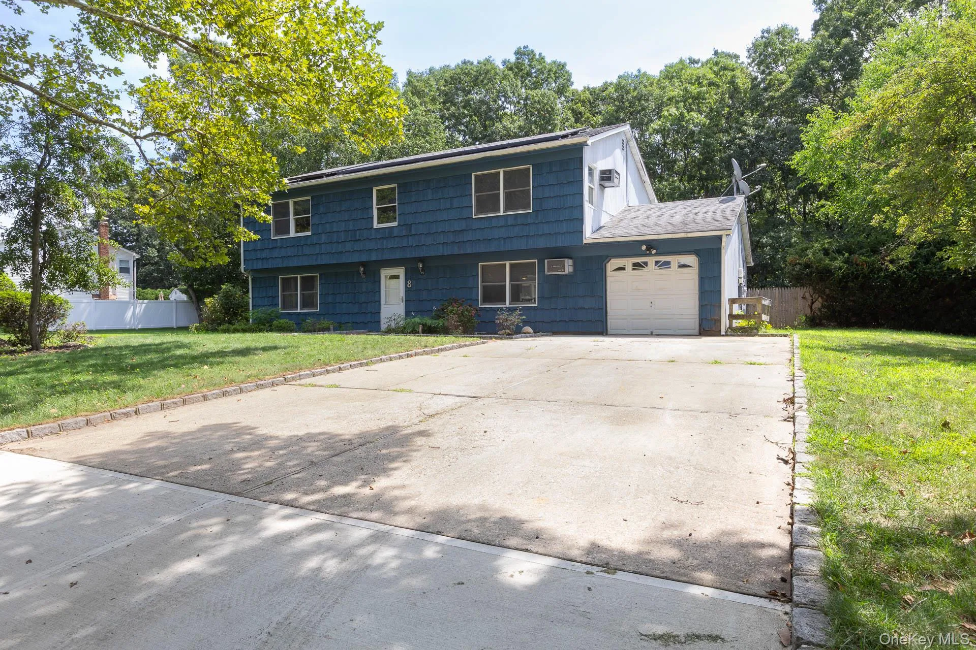 Double wide driveway. Belgium block lined. Can fit 4-6 vehicles. Double wide driveway. Belgium block lined. Can fit 4-6 vehicles.