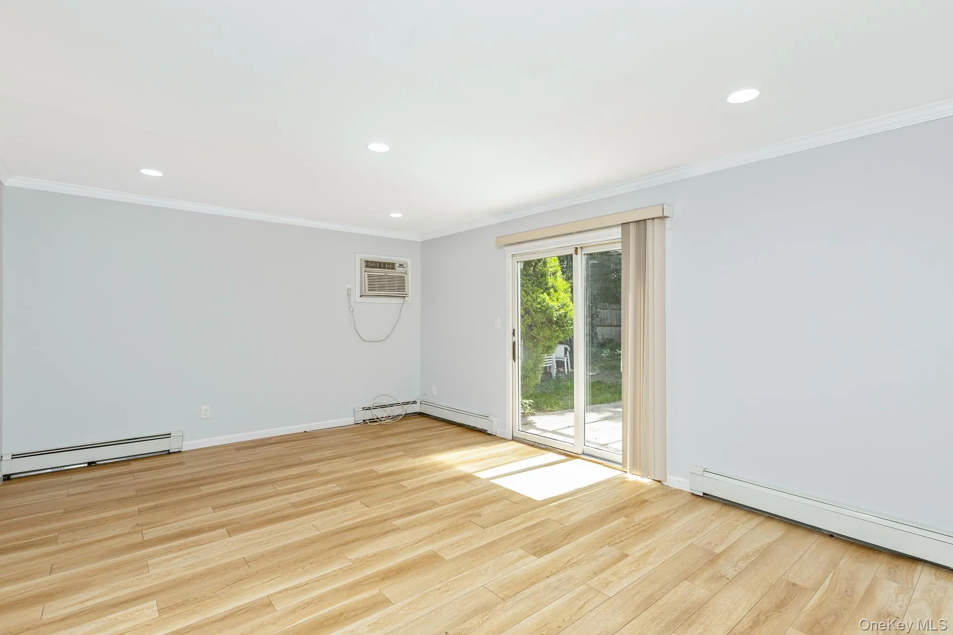 Sliding doors to backyard. AC window unit Sliding doors to backyard. AC window unit