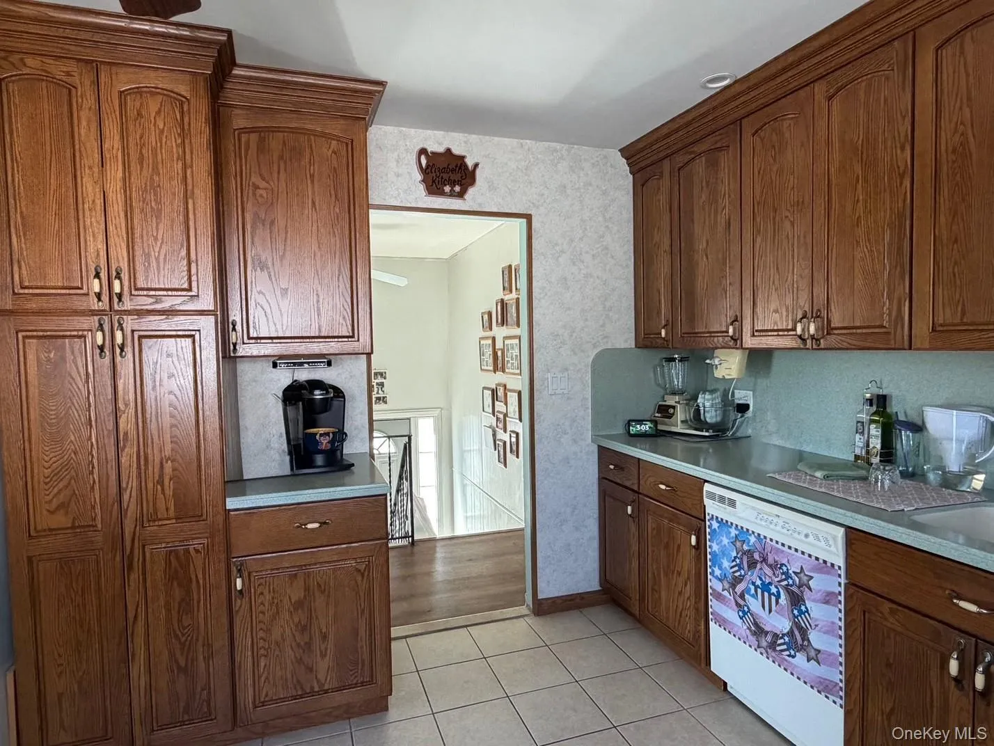 Large kitchen with tile floors and updated cabinets Large kitchen with tile floors and updated cabinets