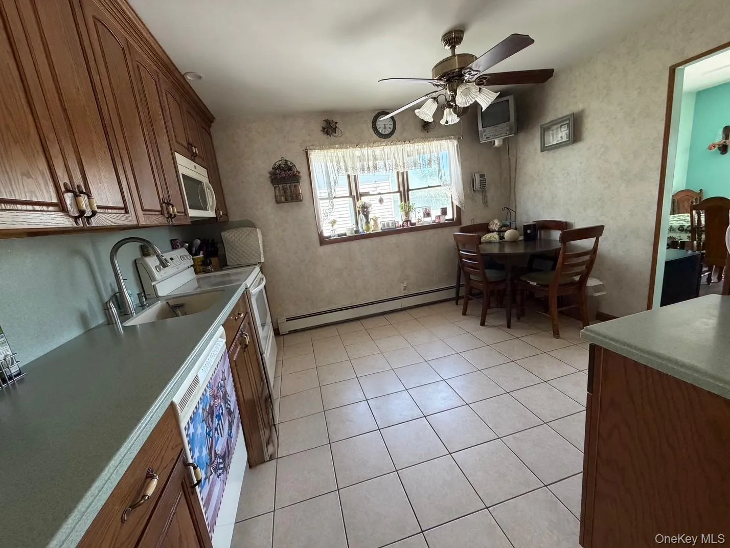 Eat in Kitchen with opening to Dining Room Eat in Kitchen with opening to Dining Room