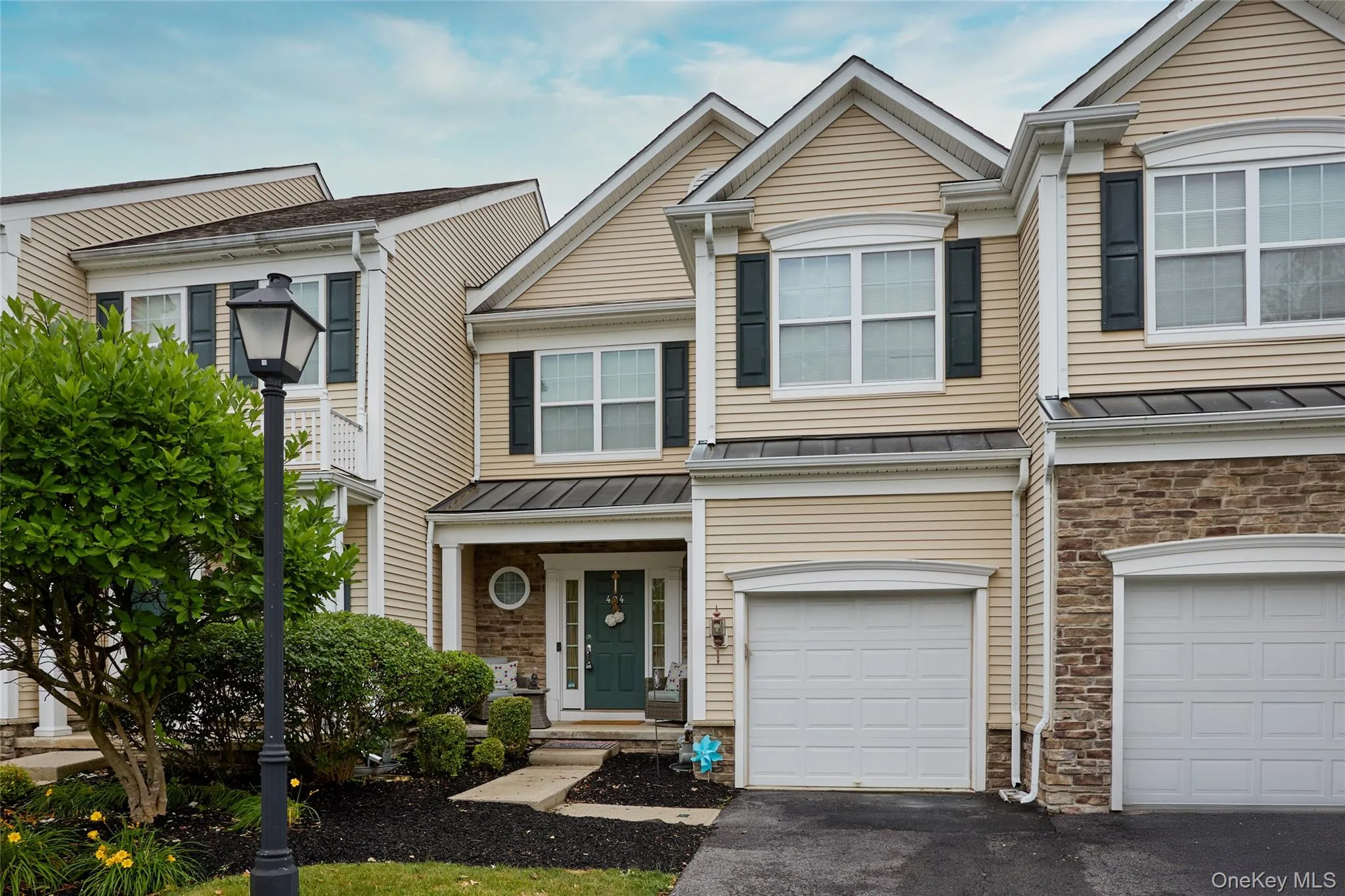 Middle unit with one car attached garage Middle unit with one car attached garage