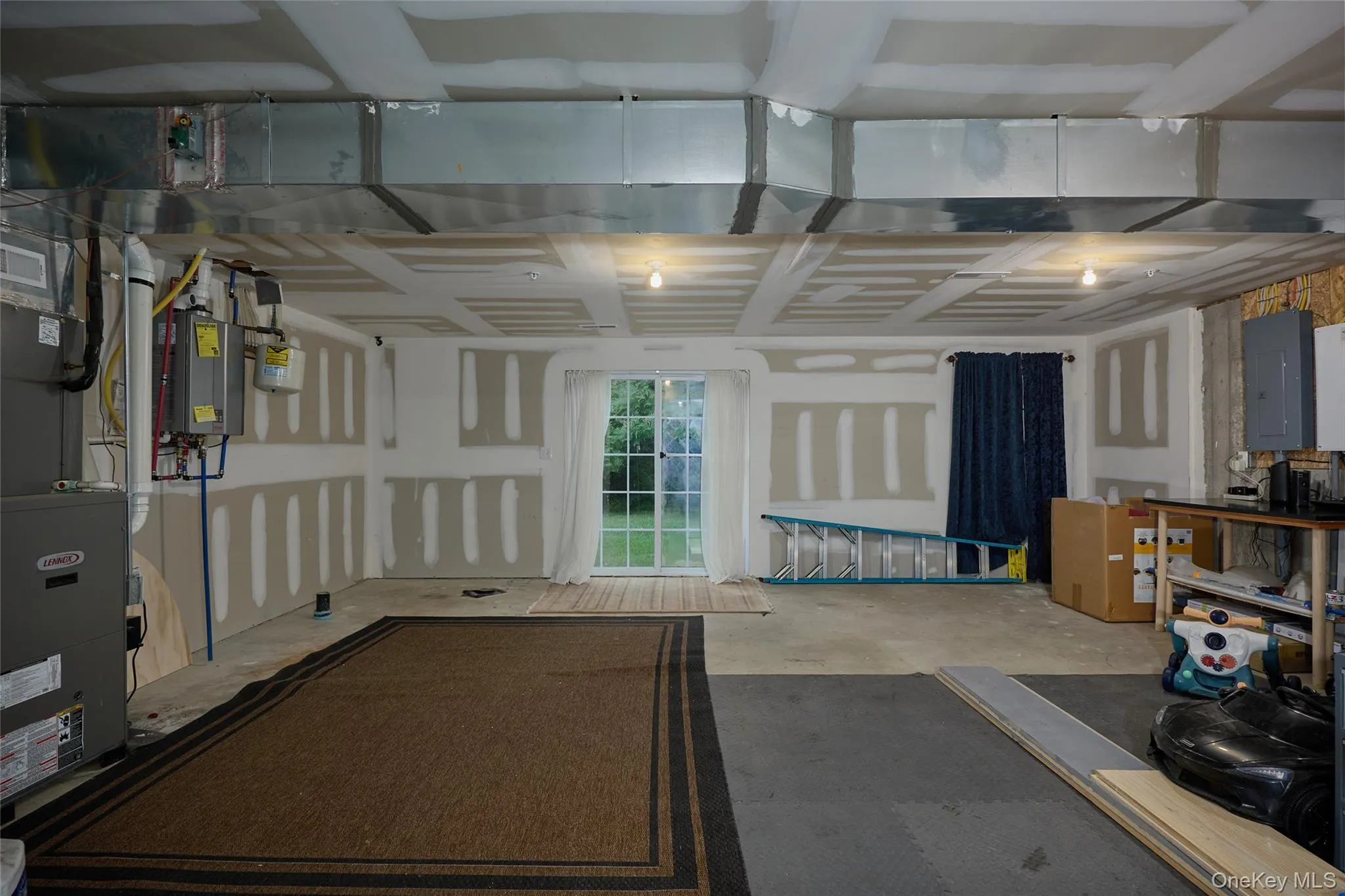 Walk out basement with heat and AC, sprinkler system, plumbed for a bathroom Walk out basement with heat and AC, sprinkler system, plumbed for a bathroom