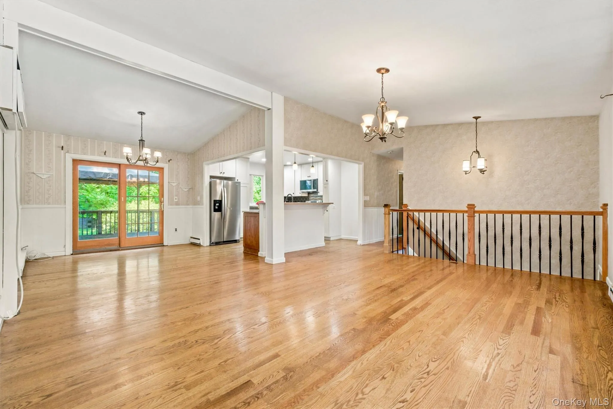 Sliding glass door leads to the deck. Hardwood floors Sliding glass door leads to the deck. Hardwood floors