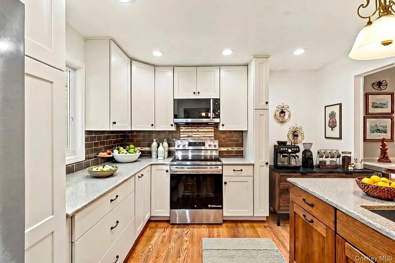 Nook is virtually staged with a coffee bar Nook is virtually staged with a coffee bar