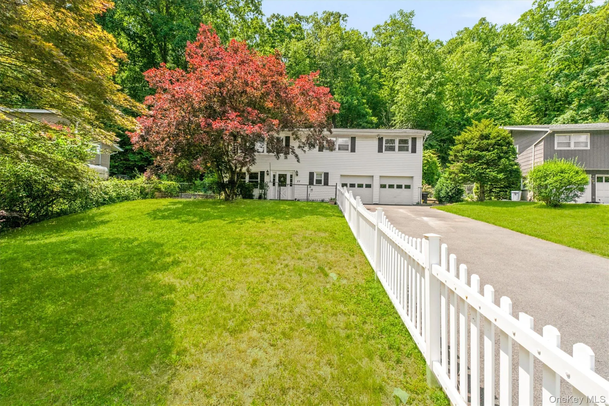 Expansive fenced front yard for all little ones. Expansive fenced front yard for all little ones.