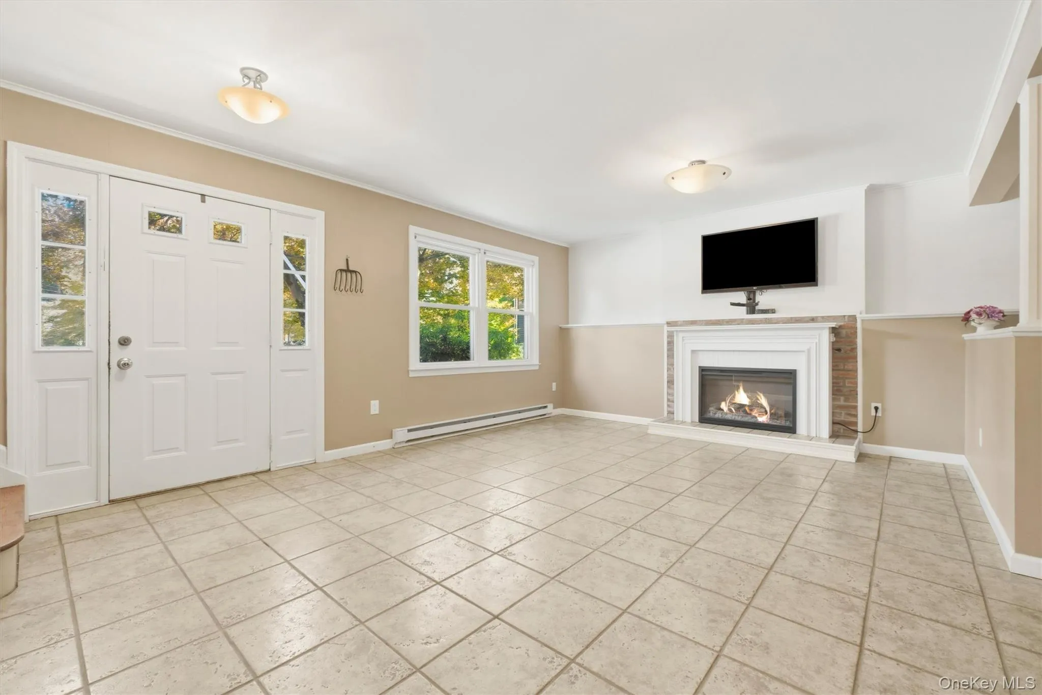One step is easy access directly into the lower level family room One step is easy access directly into the lower level family room
