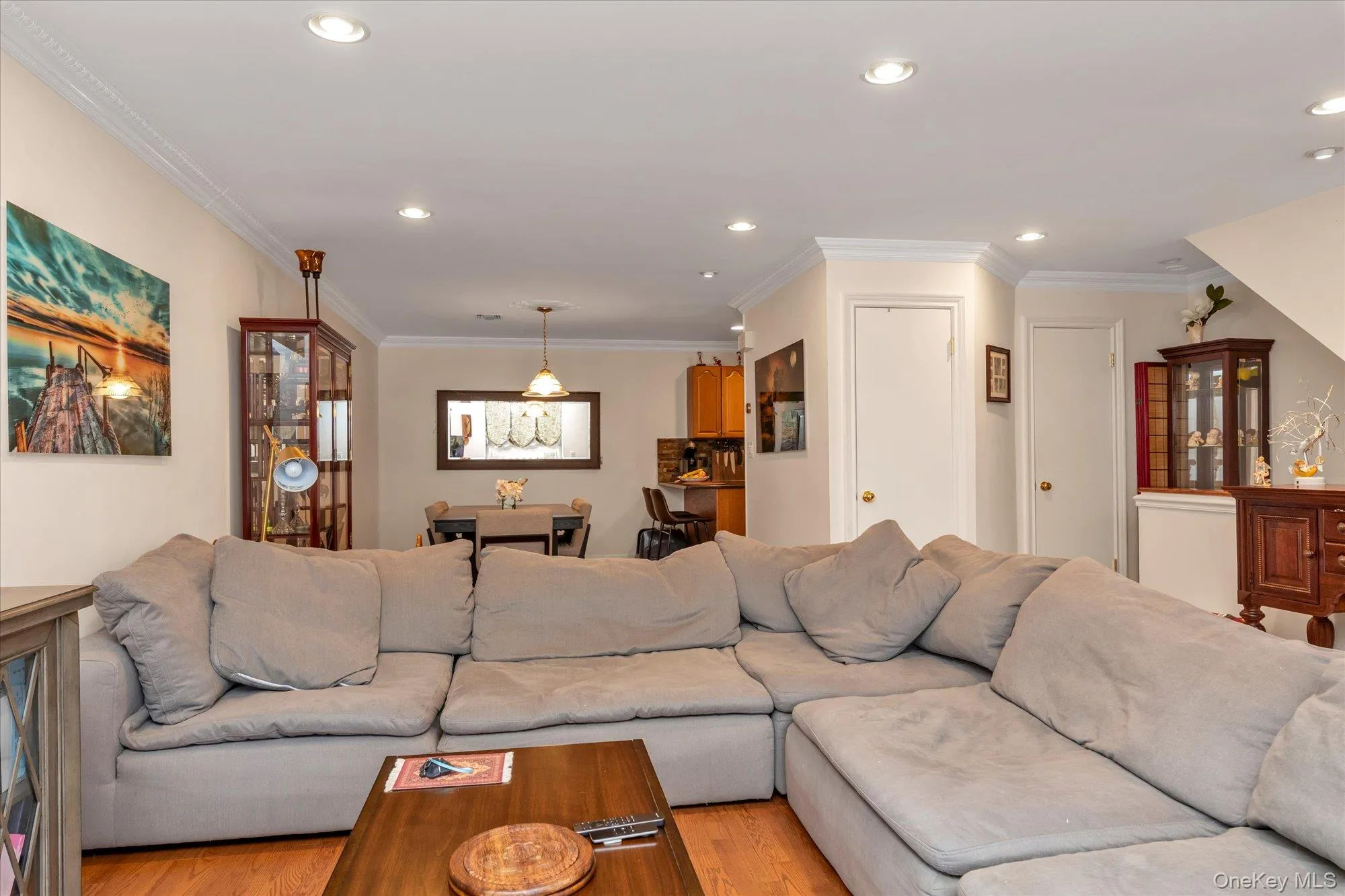 Open concept main living space with Living room leading to dining room. Open concept main living space with Living room leading to dining room.
