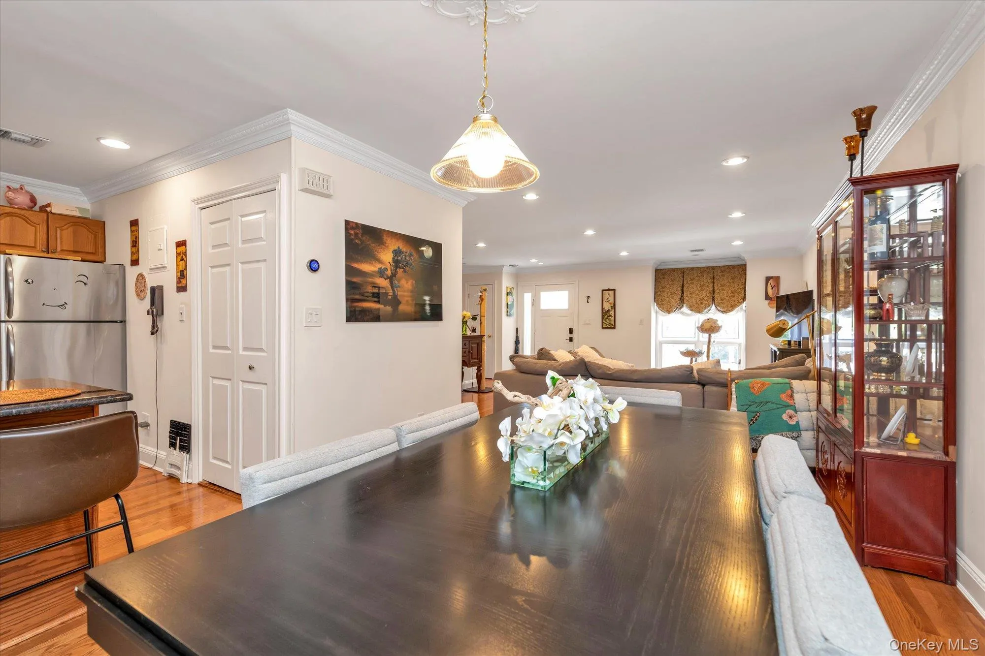 Open-concept dining room to both peninsula granite kitchen and spacious living room. Open-concept dining room to both peninsula granite kitchen and spacious living room.