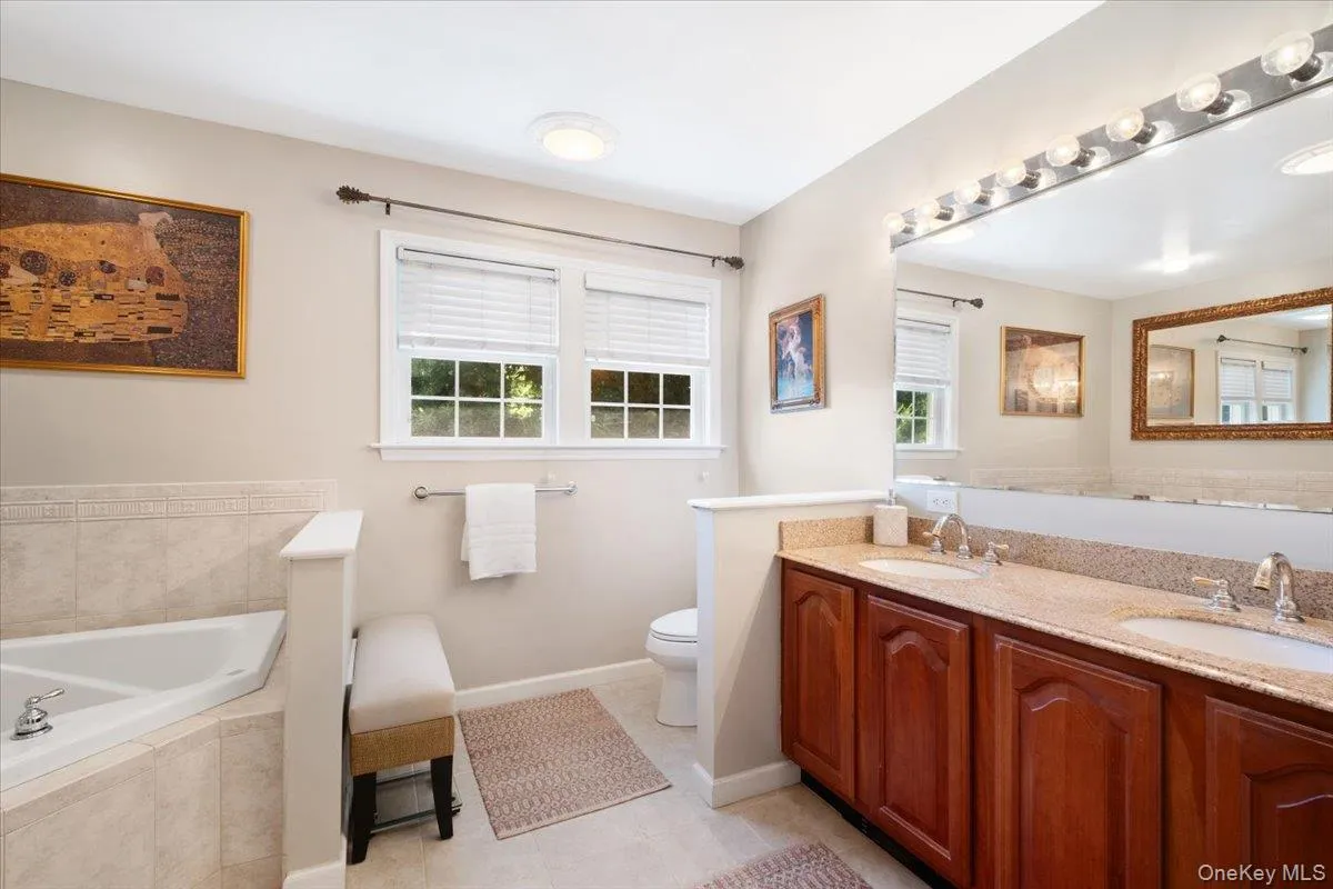 double sink, jacuzzi, and separate shower double sink, jacuzzi, and separate shower