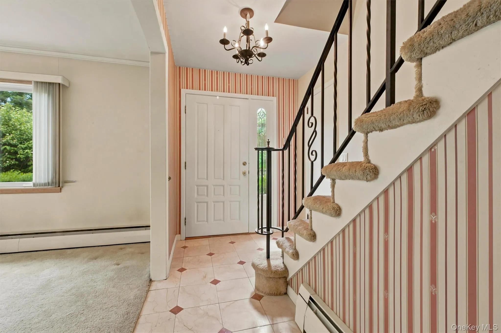 Tiled entryway & hall way w/hall closet Tiled entryway & hall way w/hall closet