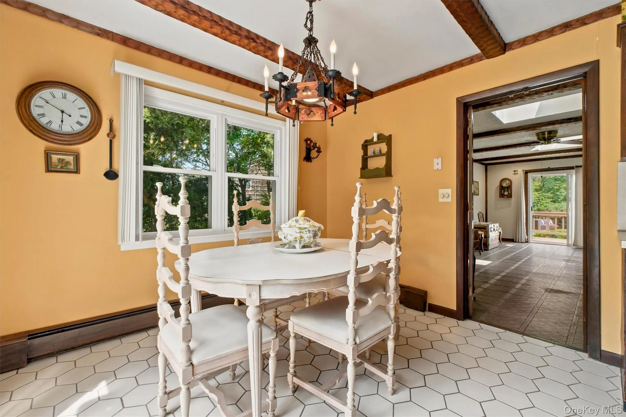 Breakfast nook leads to family room on one side and deck on other. Breakfast nook leads to family room on one side and deck on other.