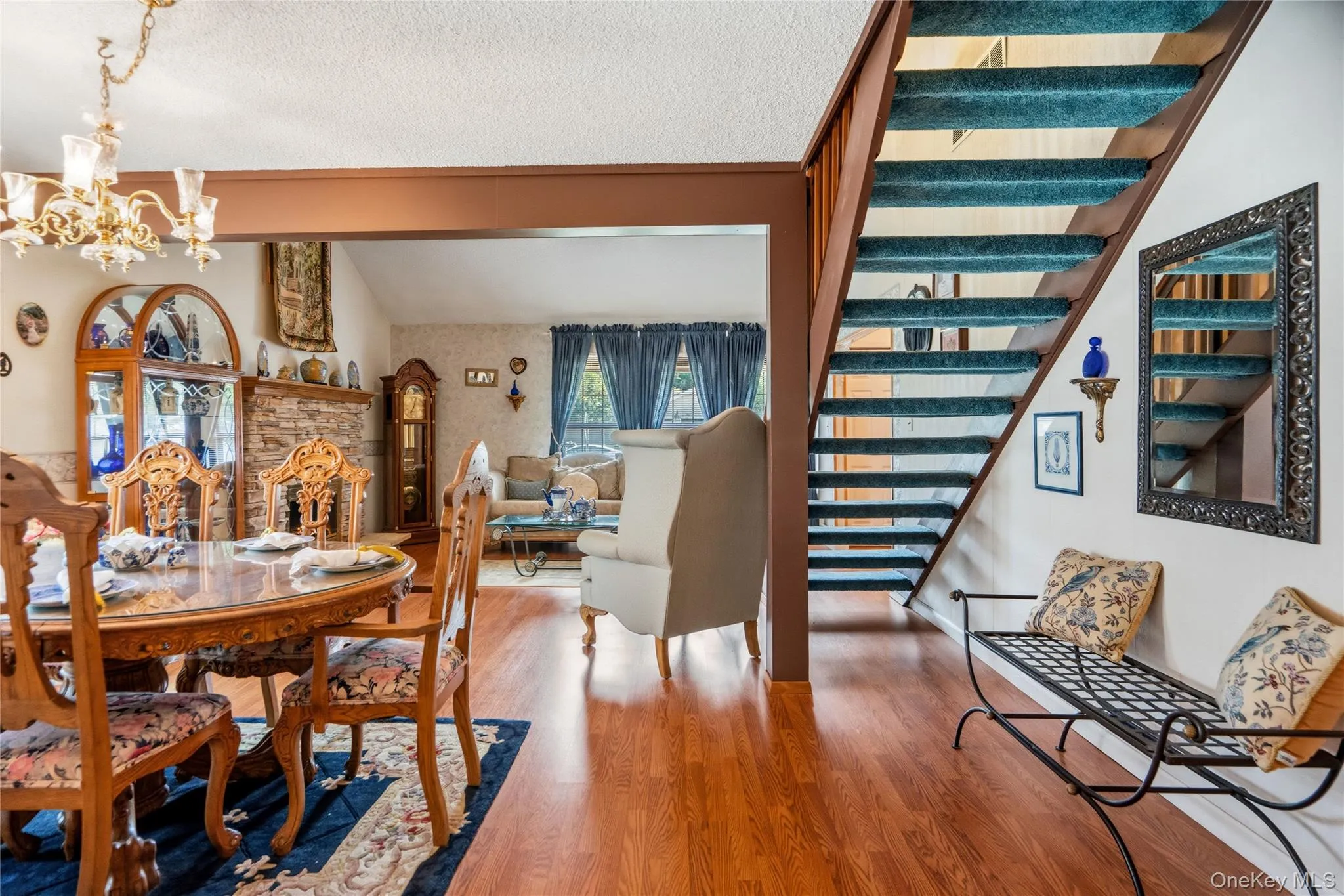 Off the dining room and living room are the stairs to the lofted family room, 4th bedroom and 3rd bathroom. Off the dining room and living room are the stairs to the lofted family room, 4th bedroom and 3rd bathroom.