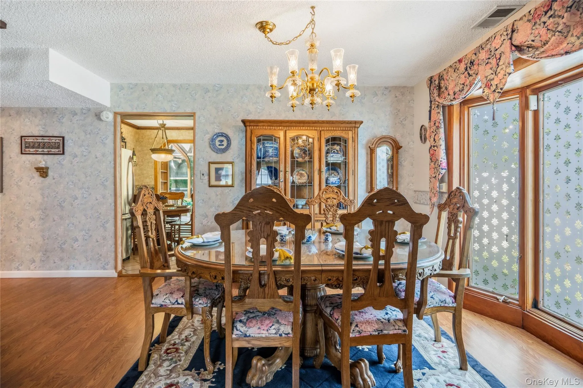 The formal dining room flows off of the living room. The formal dining room flows off of the living room.