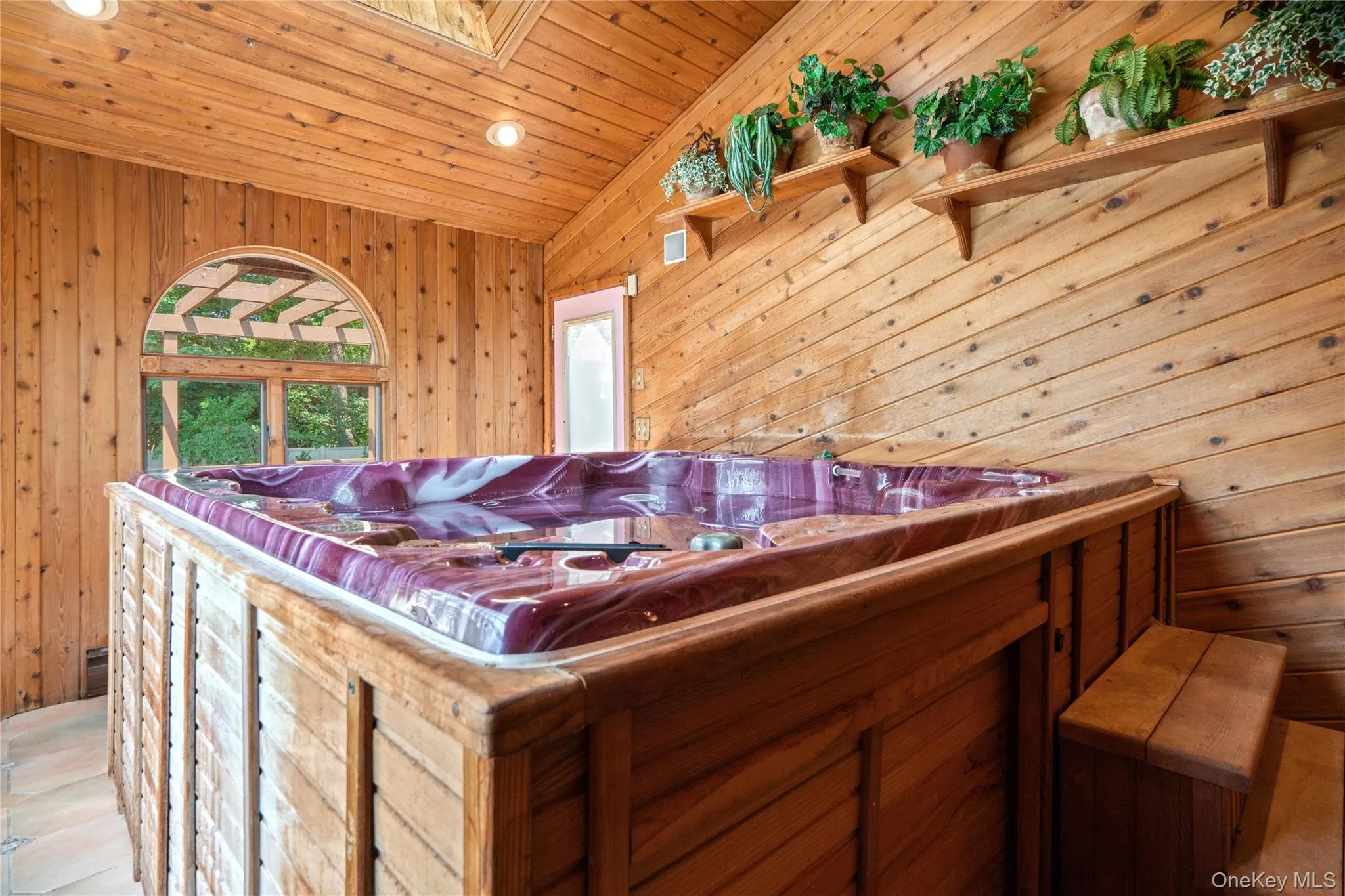 ...while the large window brings in natural light & outdoor views. The room also features an independent electric baseboard heater, motorized skylight and an exterior door to the back deck. ...while the large window brings in natural light & outdoor views. The room also features an independent electric baseboard heater, motorized skylight and an exterior door to the back deck.