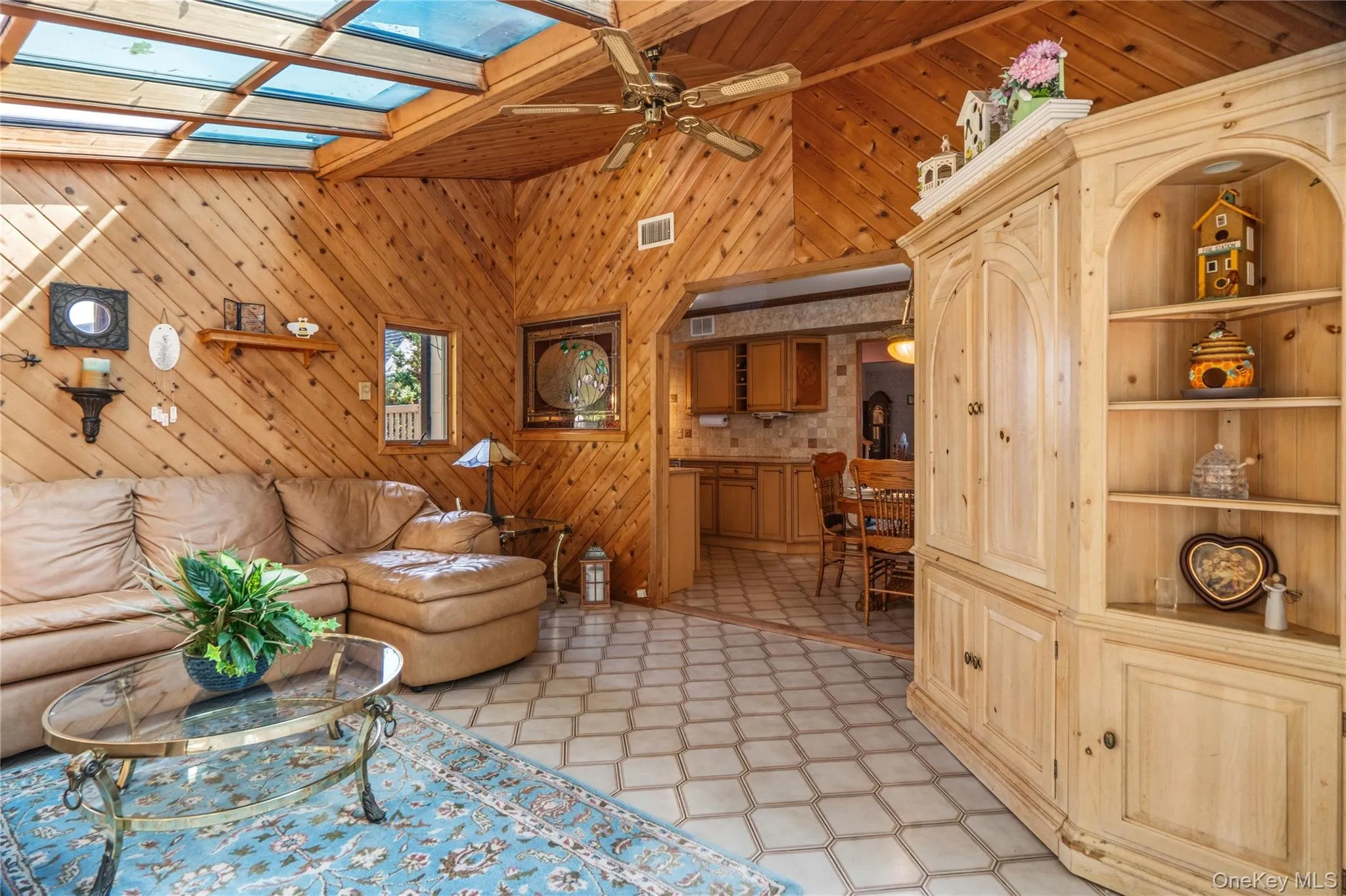 The warm wood finishes add character & charm to this great room. The warm wood finishes add character & charm to this great room.