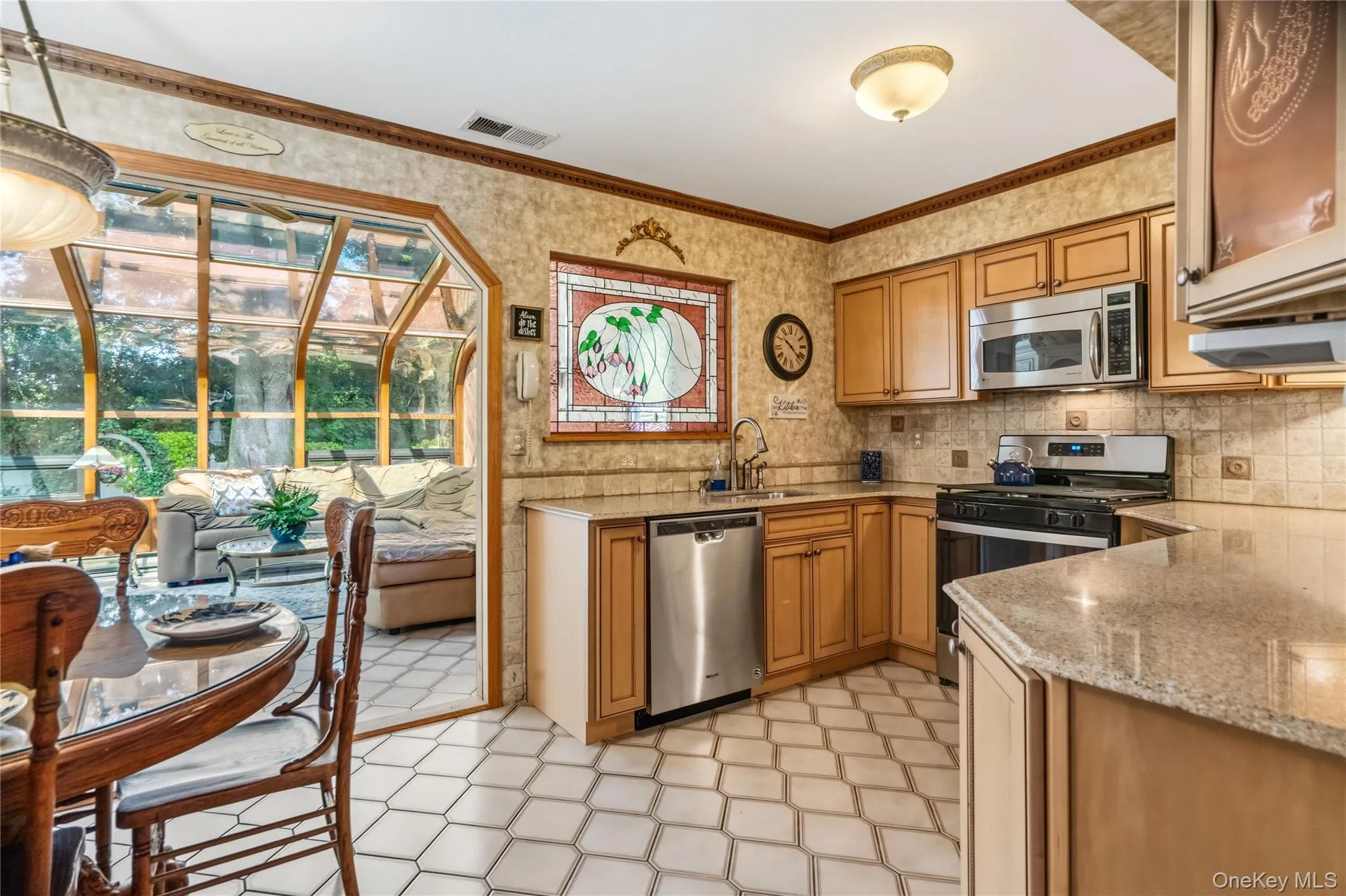 Enter from the dining room into the eat-in-kitchen. Enter from the dining room into the eat-in-kitchen.