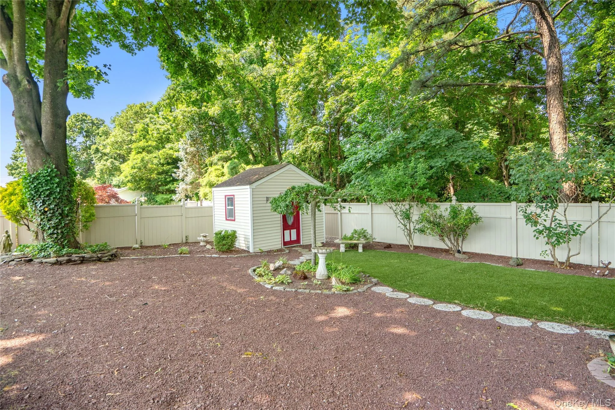 ...and a quaint little shed. All these improvements make this an enjoyable back yard for all seasons! ...and a quaint little shed. All these improvements make this an enjoyable back yard for all seasons!