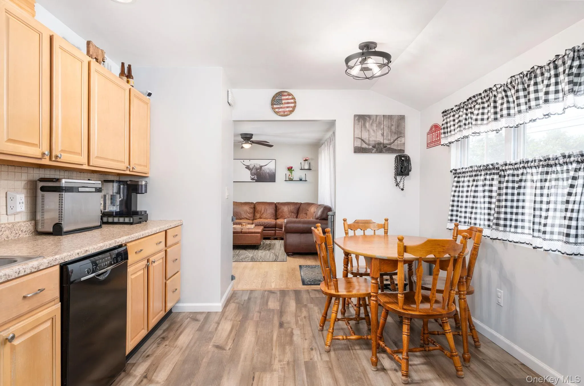 Kitchen with dedicated eating area. Kitchen with dedicated eating area.