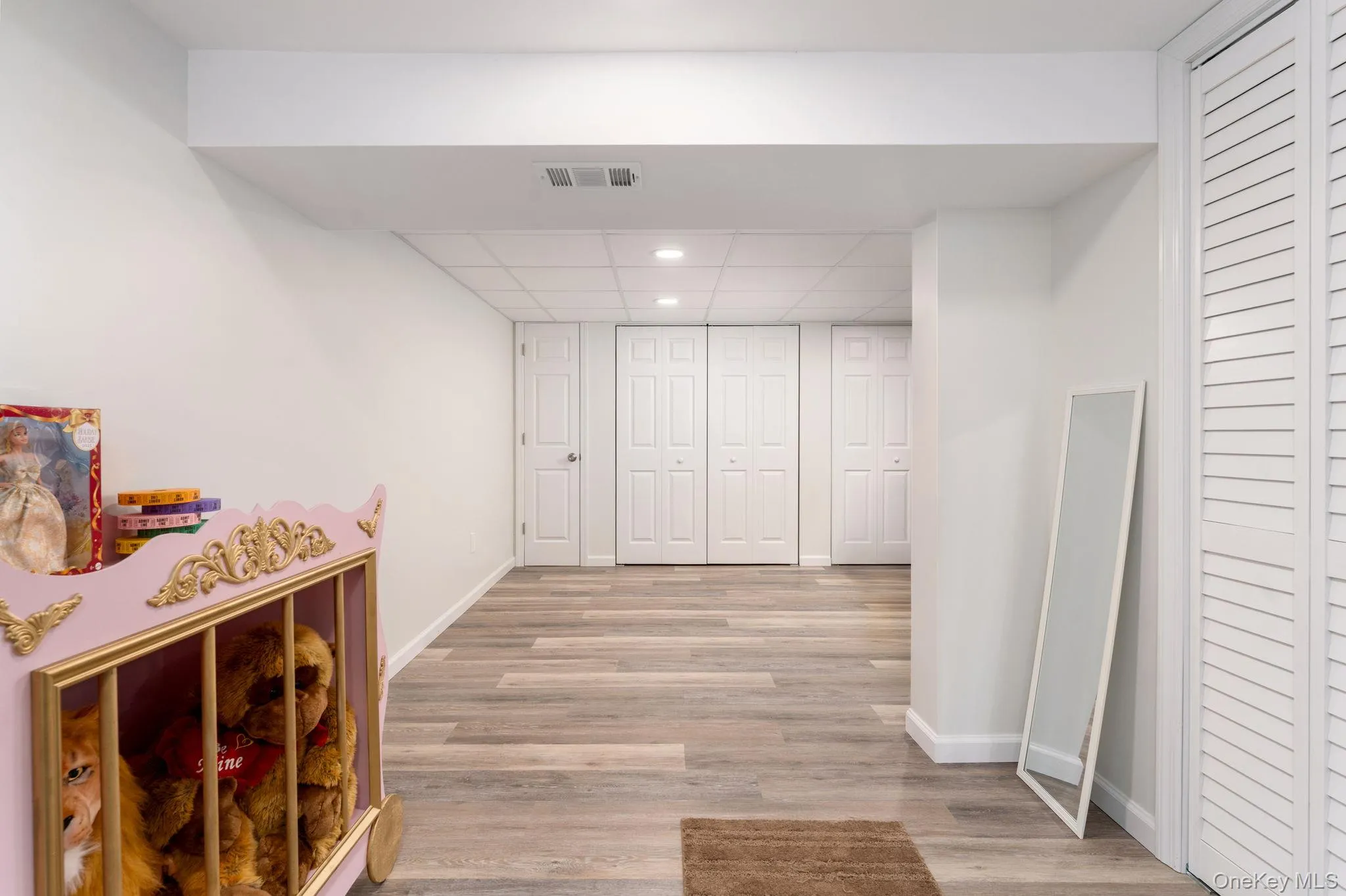 Finished Basement with LVP (Vinyl Plank) flooring, recessed LED lighting and closet space. Finished Basement with LVP (Vinyl Plank) flooring, recessed LED lighting and closet space.