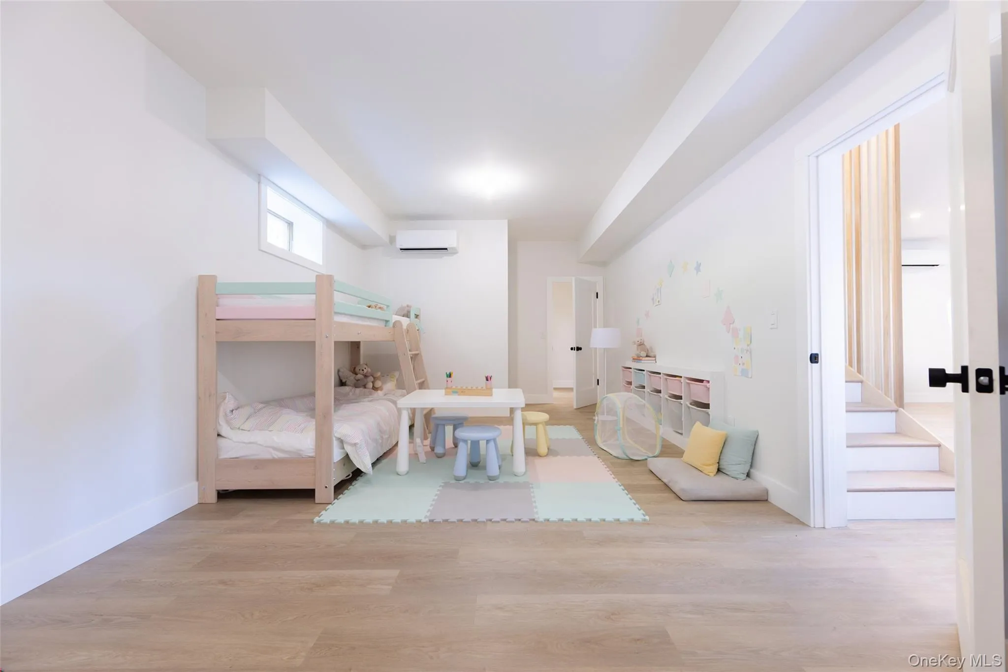 Bright interior spave featuring wood-finish flooring, white walls, and recessed lightingImages have been virtually staged to illustrate the property's potential Bright interior spave featuring wood-finish flooring, white walls, and recessed lightingImages have been virtually staged to illustrate the property's potential