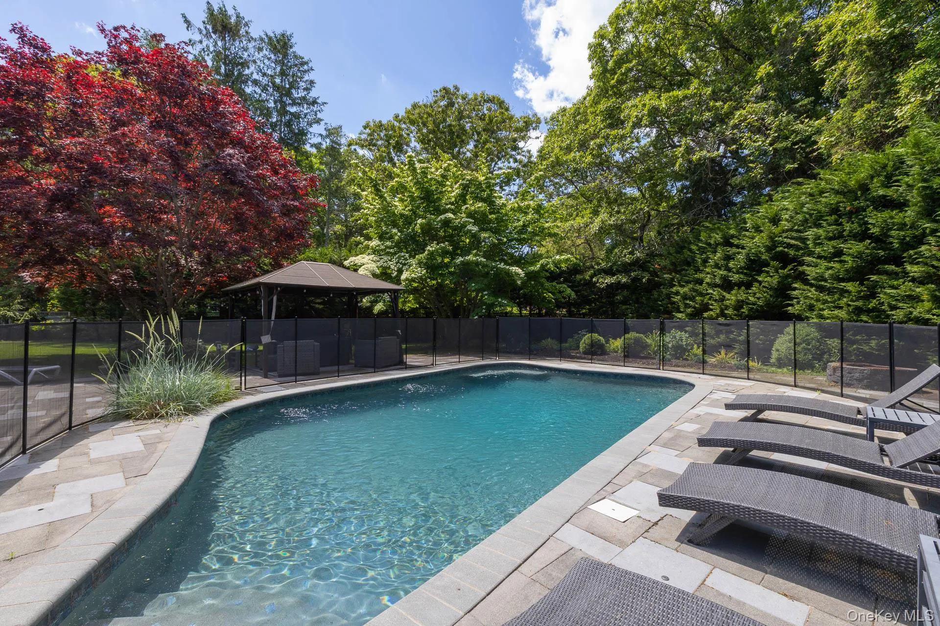 Country club back yard with in ground and fire pit Country club back yard with in ground and fire pit