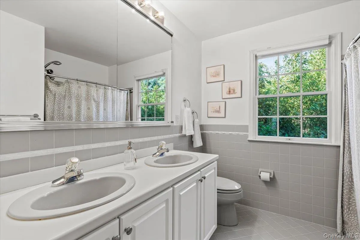 Hall bath with two sinks Hall bath with two sinks