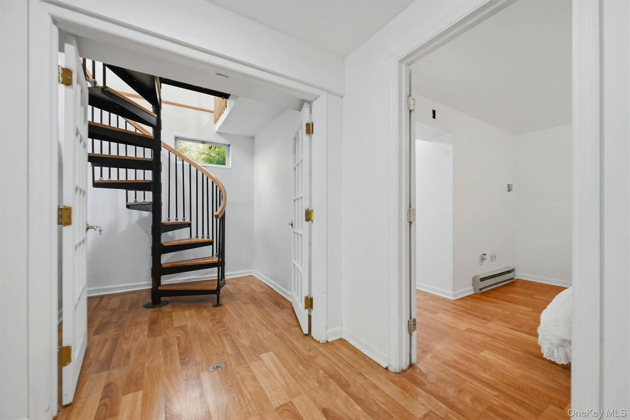 Spiral Staircase to Lower Level In-Law Suite Spiral Staircase to Lower Level In-Law Suite