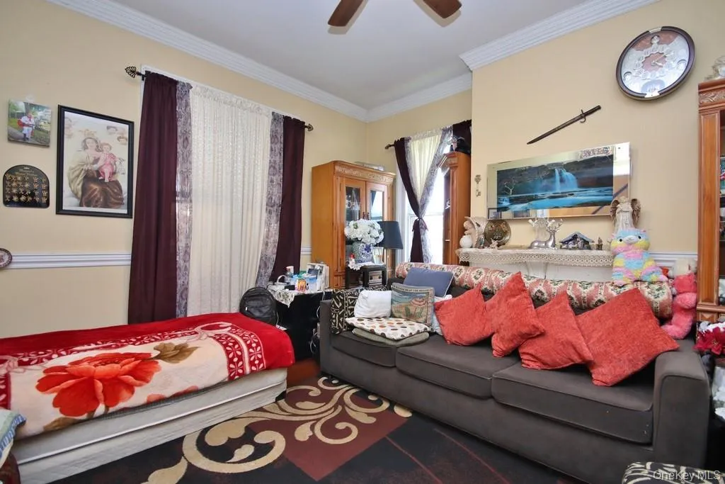 Living Room has ceiling fan with light Living Room has ceiling fan with light