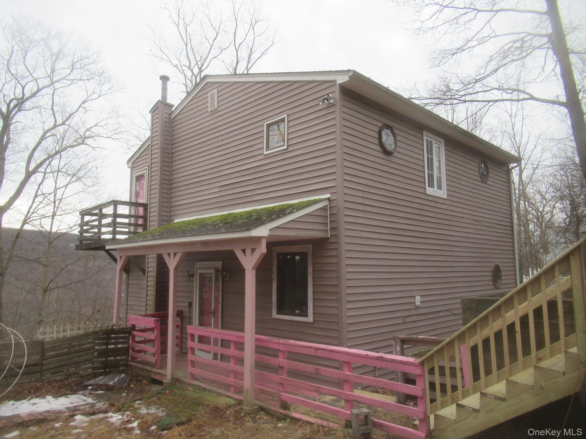 View of property exterior with a chimney View of property exterior with a chimney
