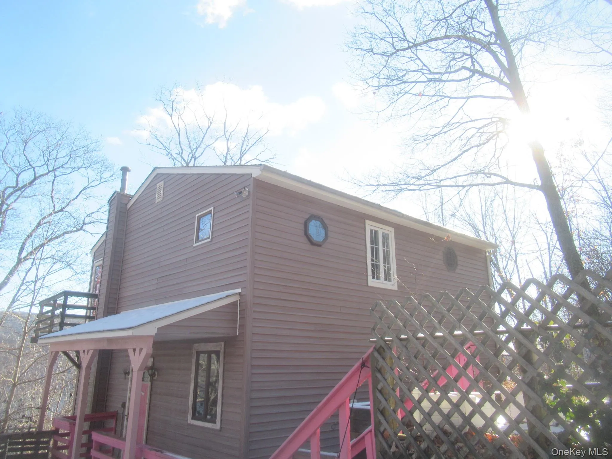 View of home's exterior with a chimney View of home's exterior with a chimney