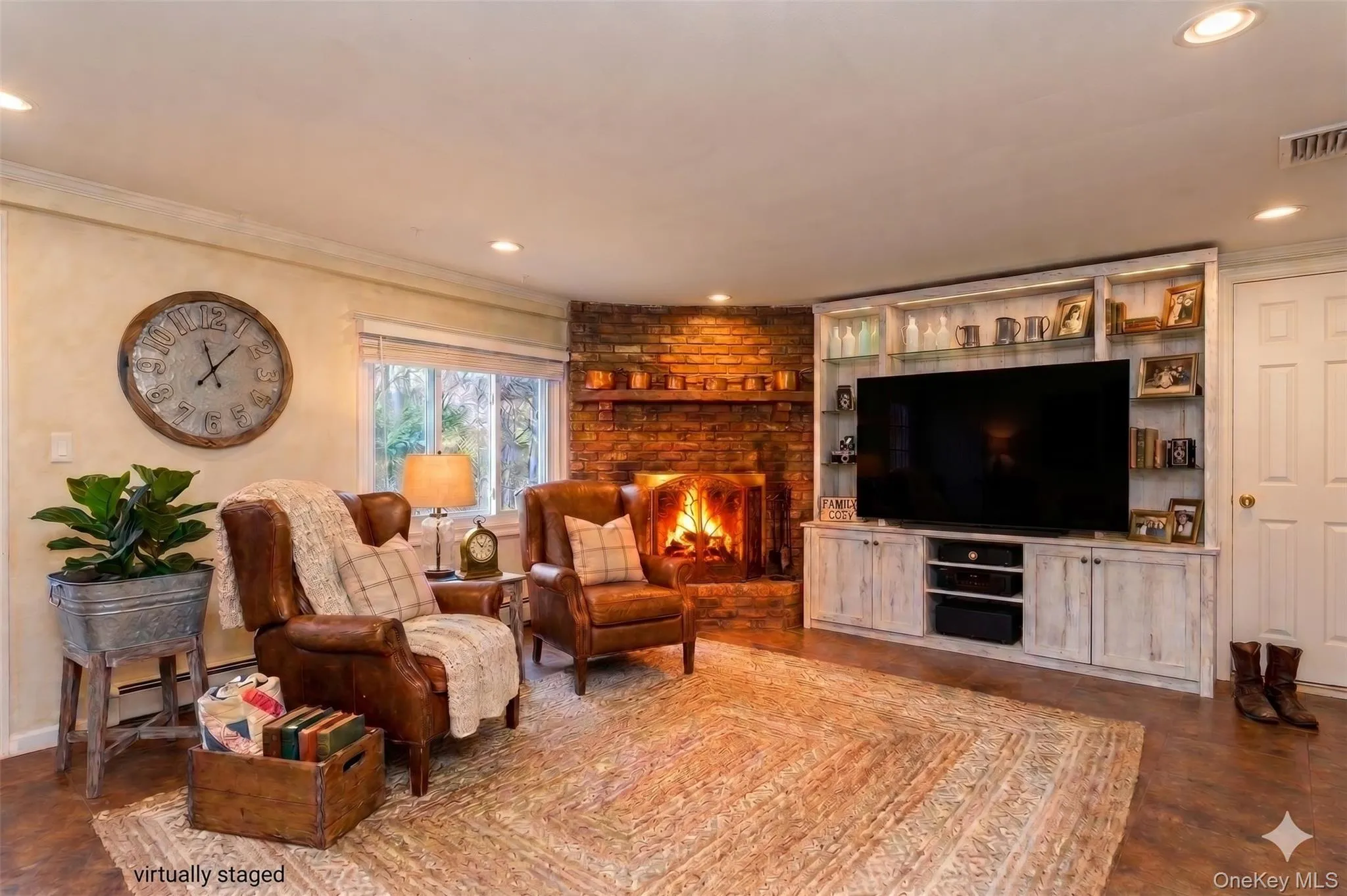 family room with fireplace / virtually staged family room with fireplace / virtually staged