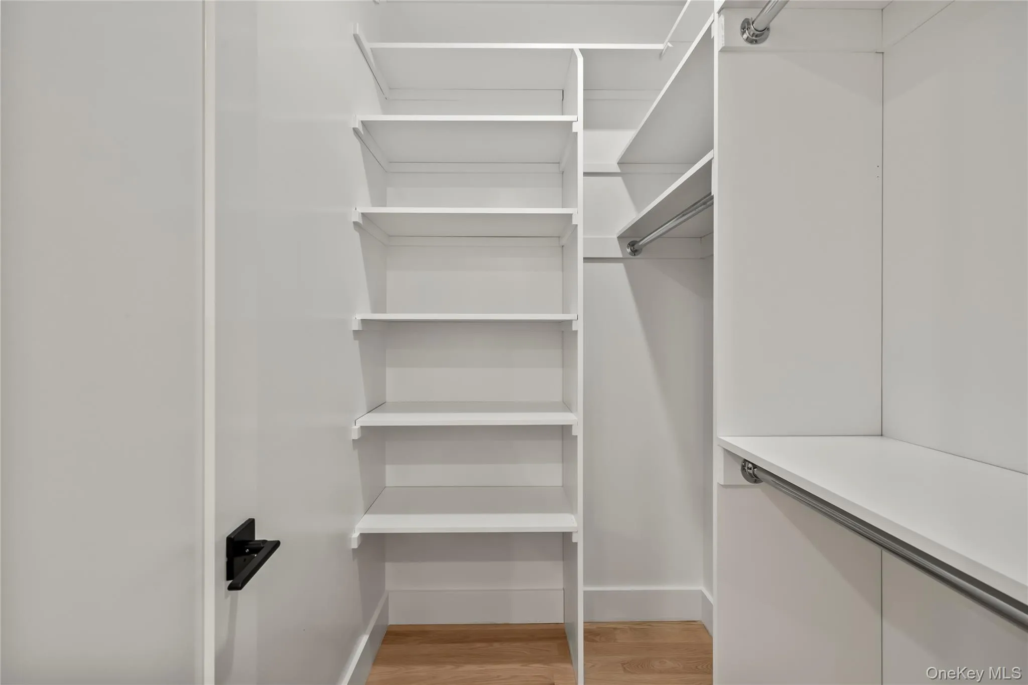 Primary Bedroom WI Closet Primary Bedroom WI Closet