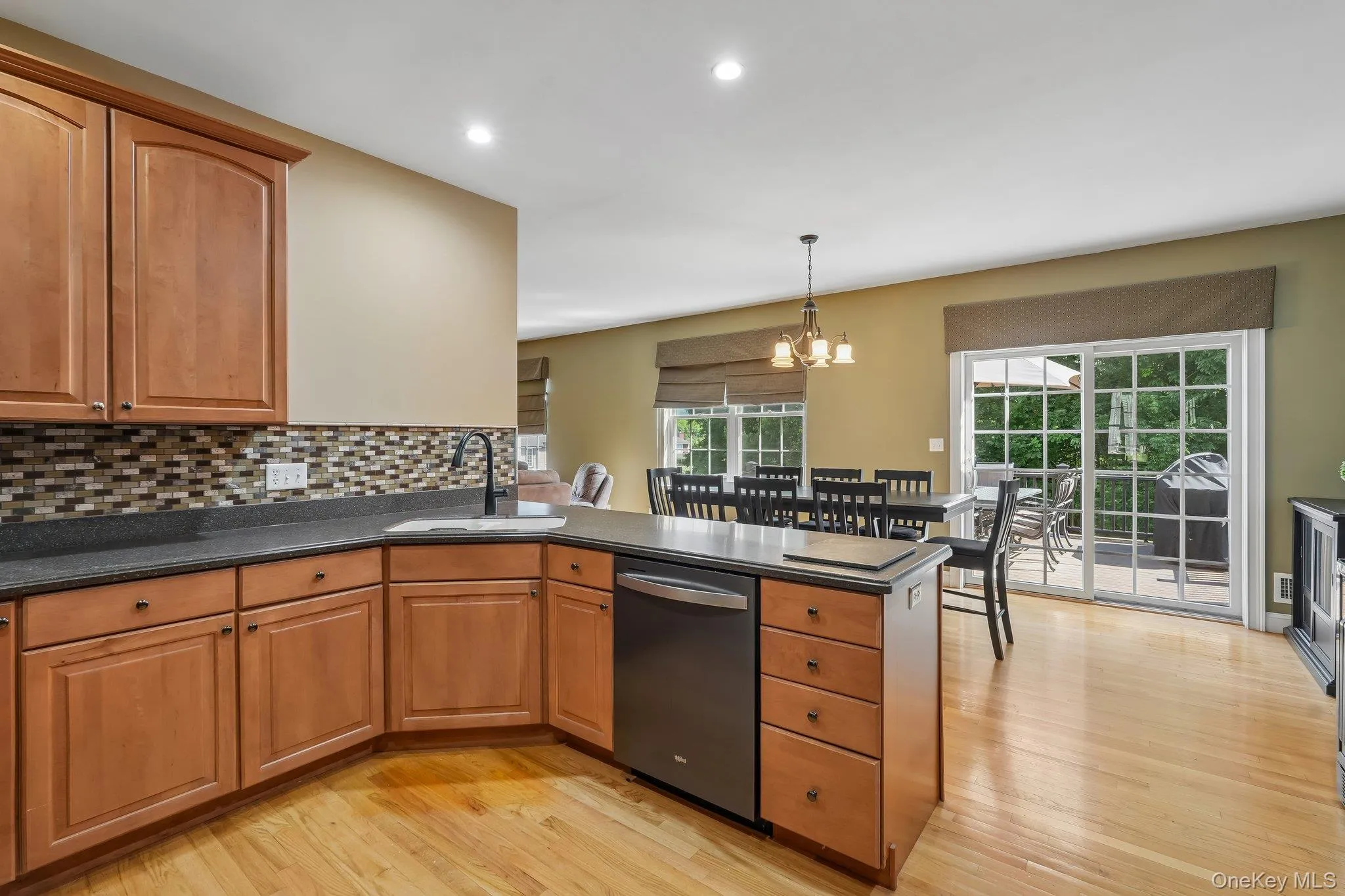 Efficient style kitchen with corian ocunter tops and maple cabinets. Efficient style kitchen with corian ocunter tops and maple cabinets.