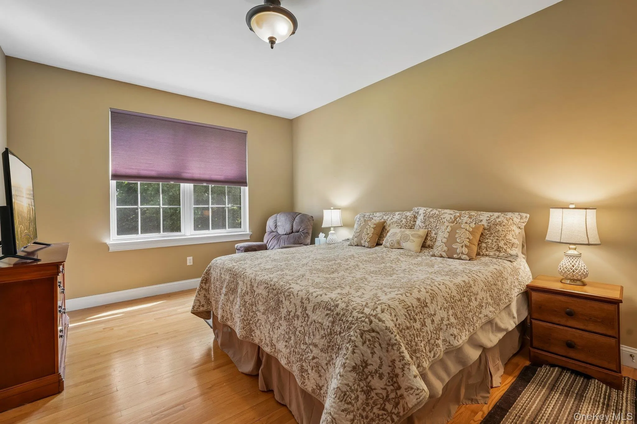 First Floor bedroom with hardwood floors and two wall closets. First Floor bedroom with hardwood floors and two wall closets.